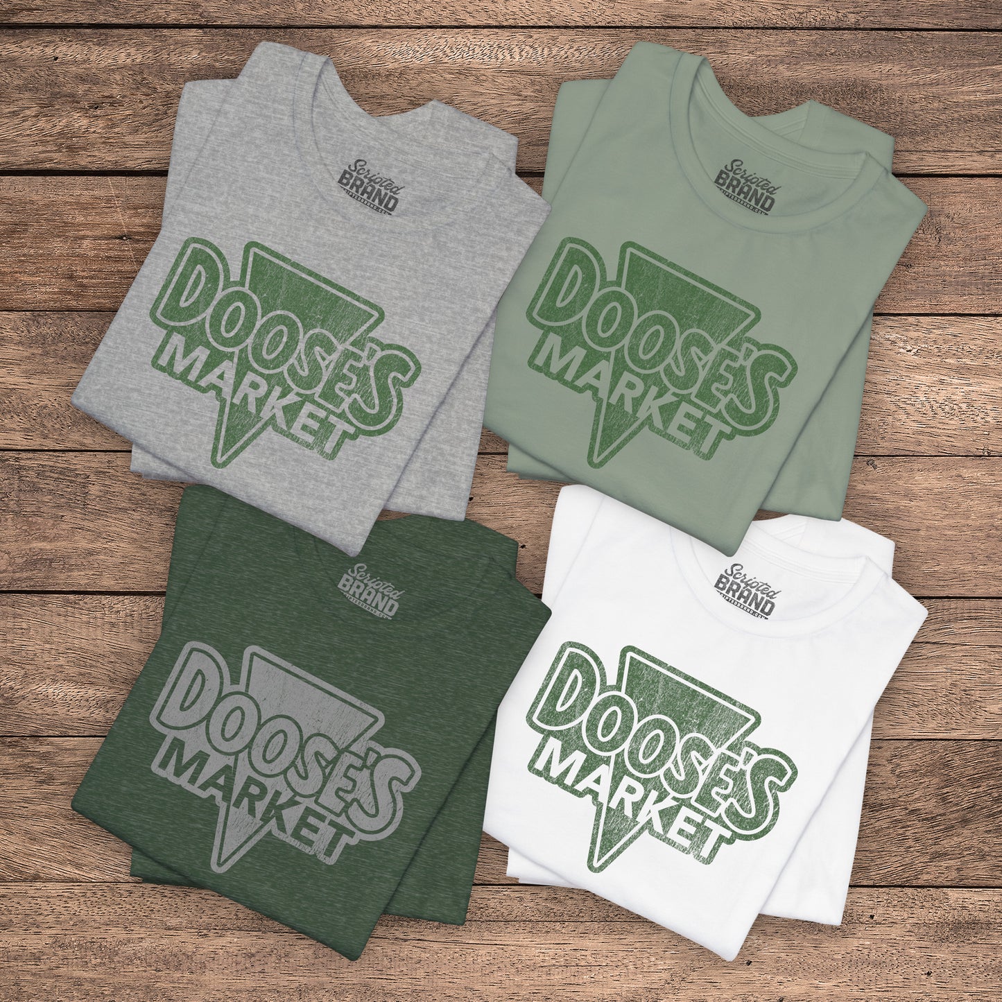 4 folded Bella+Canvas t-shirts with a vintage-style Doose’s Market logo graphic, inspired by Gilmore Girls