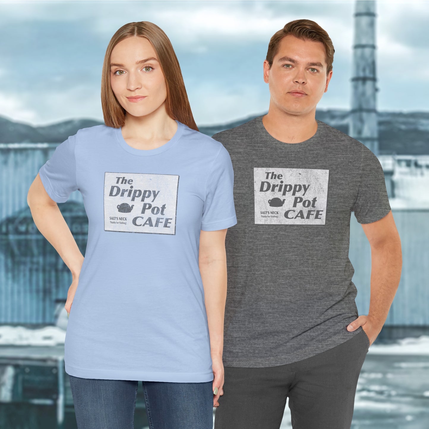 2 models wearing Bella+Canvas baby blue short-sleeve t-shirts featuring vintage Drippy Pot Café logo from Severance TV show, unisex fit