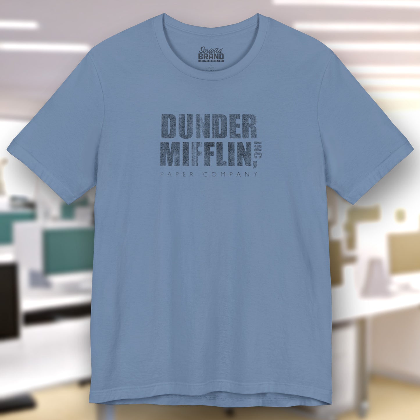 Steel Blue t-shirt featuring the Dunder Mifflin logo from the TV show The Office in a vintage distressed style.