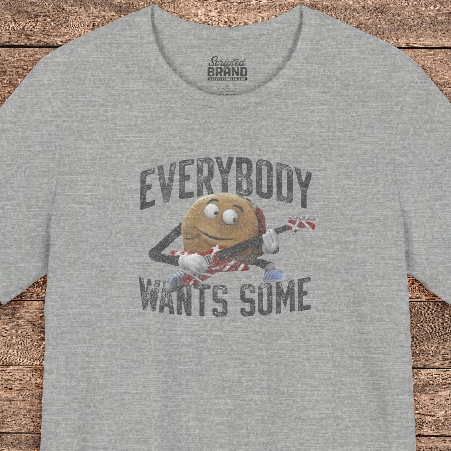 Heather Gray t-shirt with the phrase EVERYBODY WANTS SOME and a graphic of the guitar playing hamburger from the movie Better Off Dead in a vintage style.