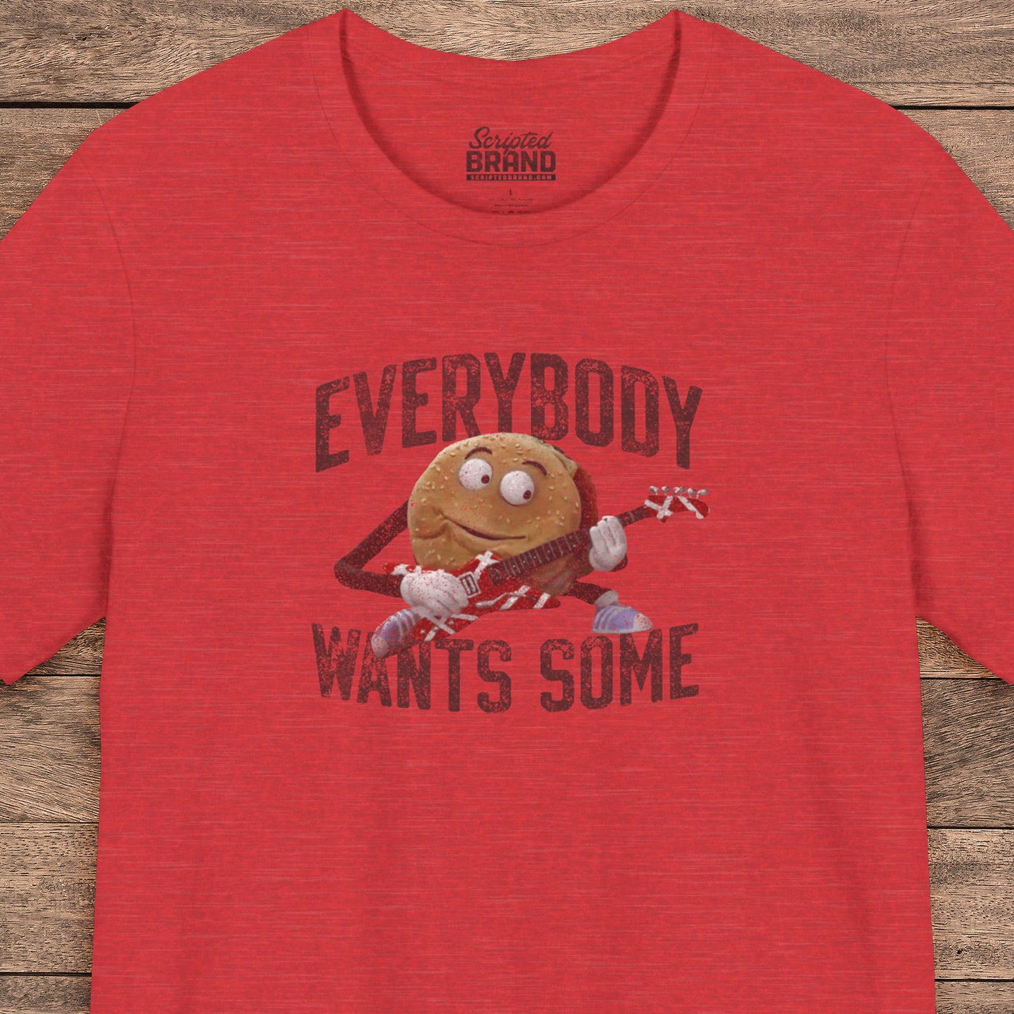 Red t-shirt with the phrase EVERYBODY WANTS SOME and a graphic of the guitar playing hamburger from the movie Better Off Dead in a vintage style.