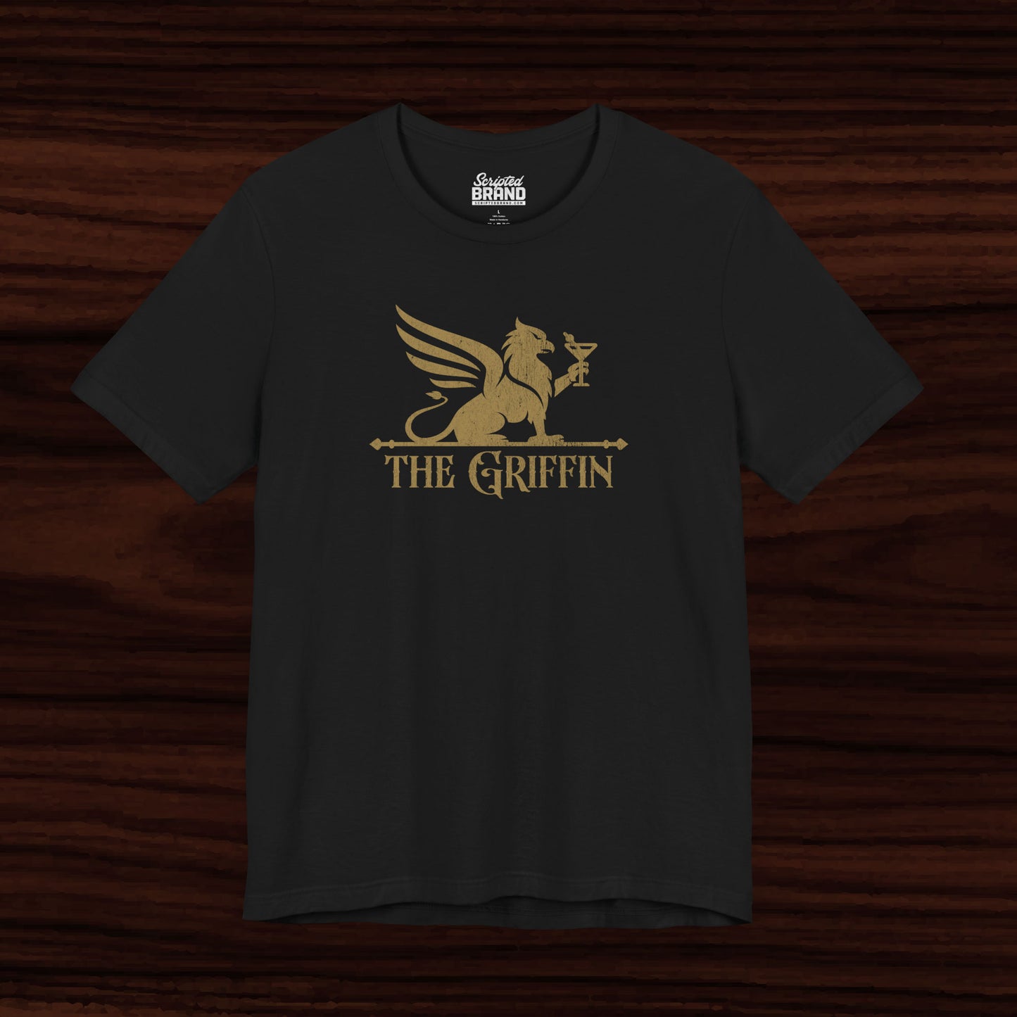 Black t-shirt featuring gold 'The Griffin' Bar logo inspired by the TV show New Girl in a vintage distressed style.