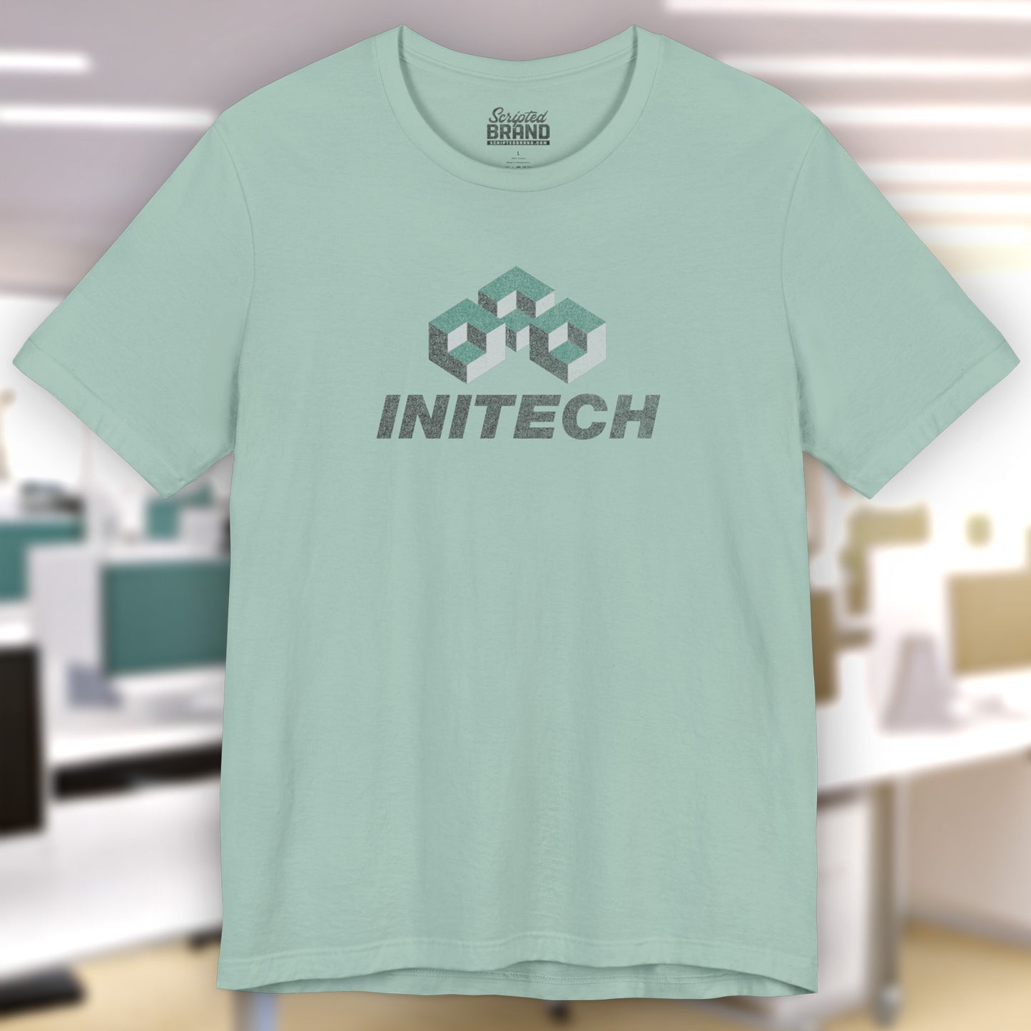Front view of a dusty blue green colored soft Bella+Canvas 3001 short-sleeve t-shirt featuring the Initech logo from the movie Office Space in a vintage distressed style, sold by ScriptedBrand.