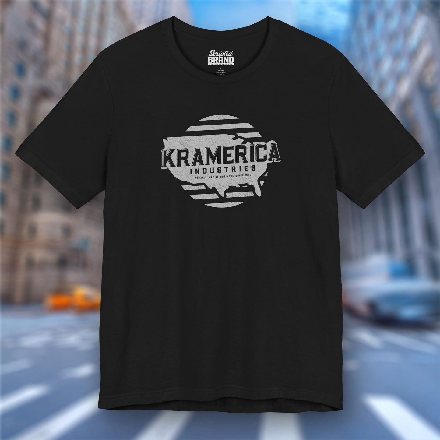Front view of a black soft unisex Bella+Canvas 3001 short-sleeve t-shirt featuring a unique Kramerica Industries logo graphic, designed by ScriptedBrand in a vintage distressed style, and inspired by the TV show Seinfeld.