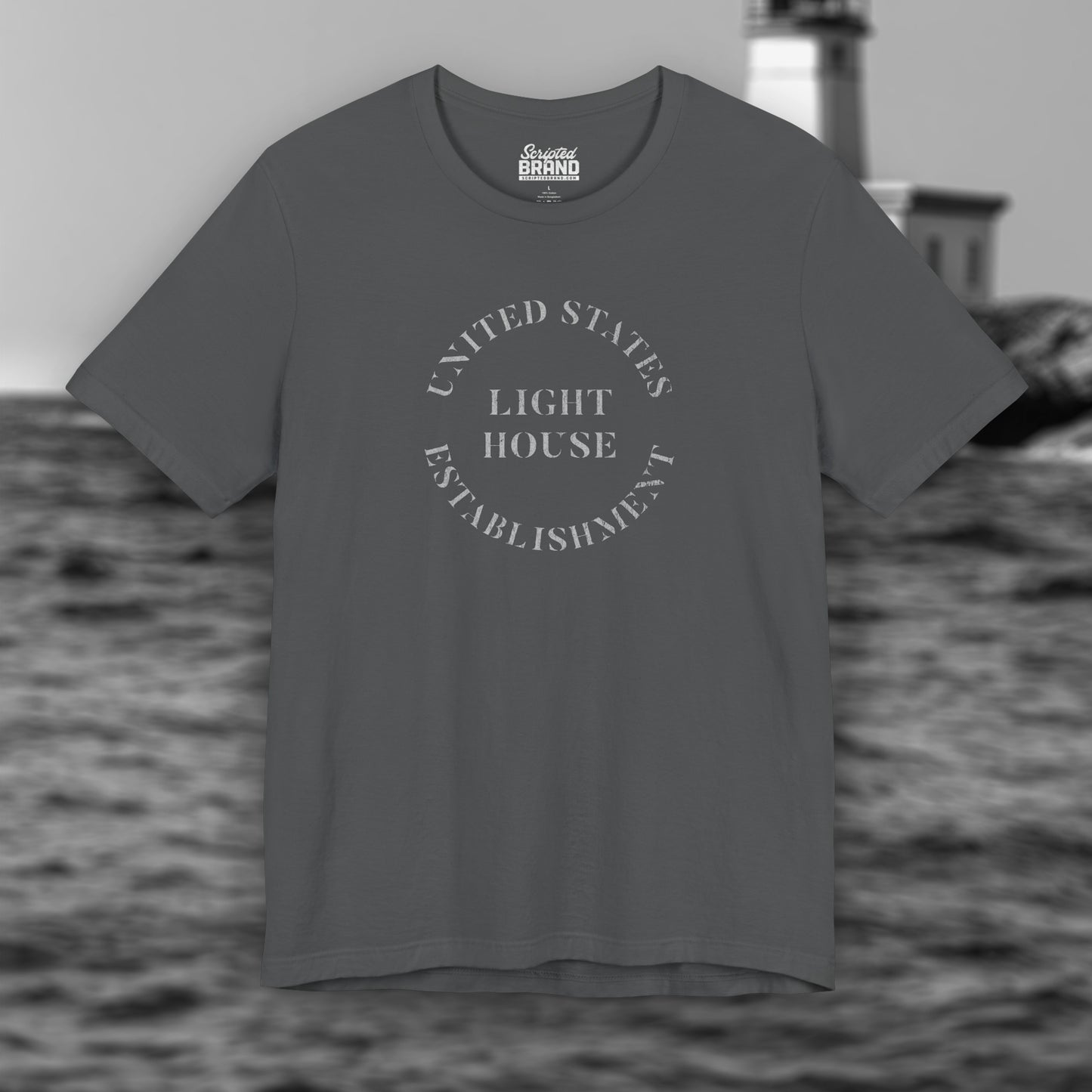 Asphalt Gray t-shirt featuring the United States Light House Establishment logo graphic worn by Robert Pattinson in the movie The Lighthouse in a vintage distressed style.