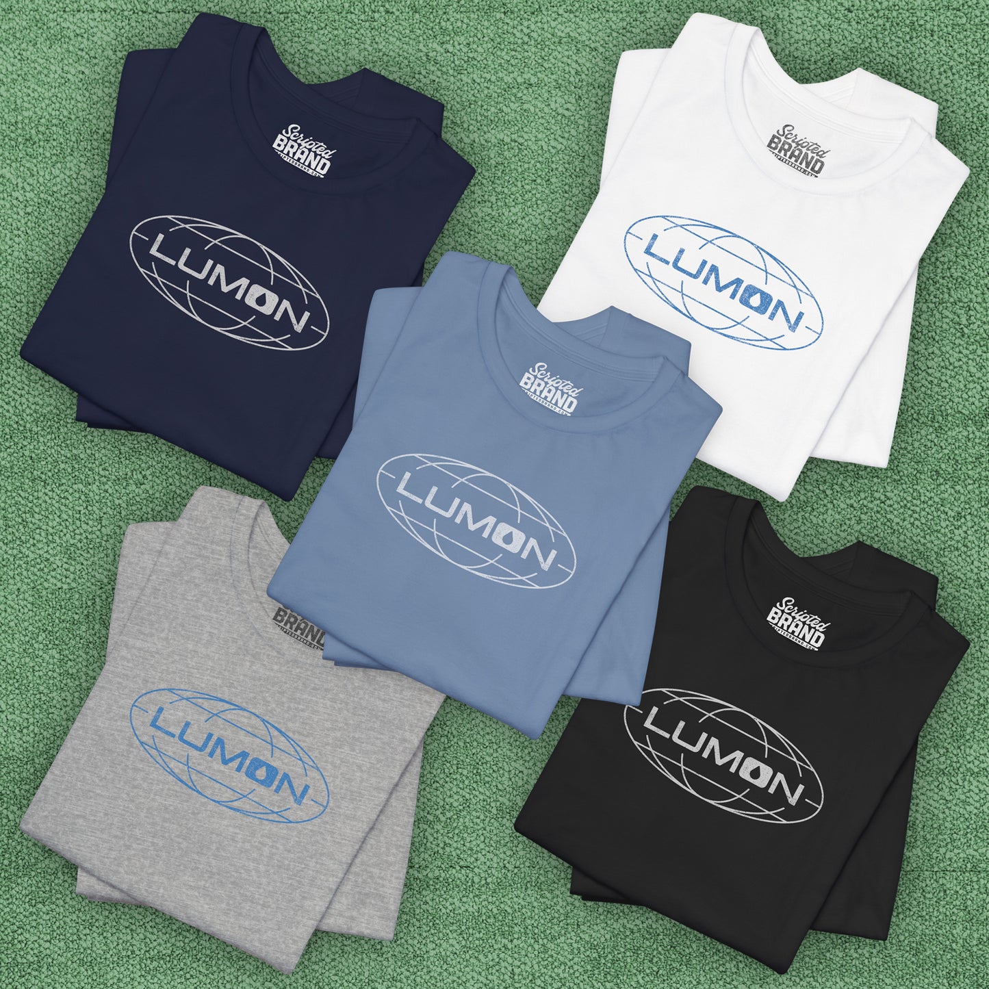 Group of 5 folded soft Bella+Canvas shirtsleeve t-shirts with the Lumon Industries logo from the TV show Severance in a vintage distressed ink-stamped style, sold by ScriptedBrand.