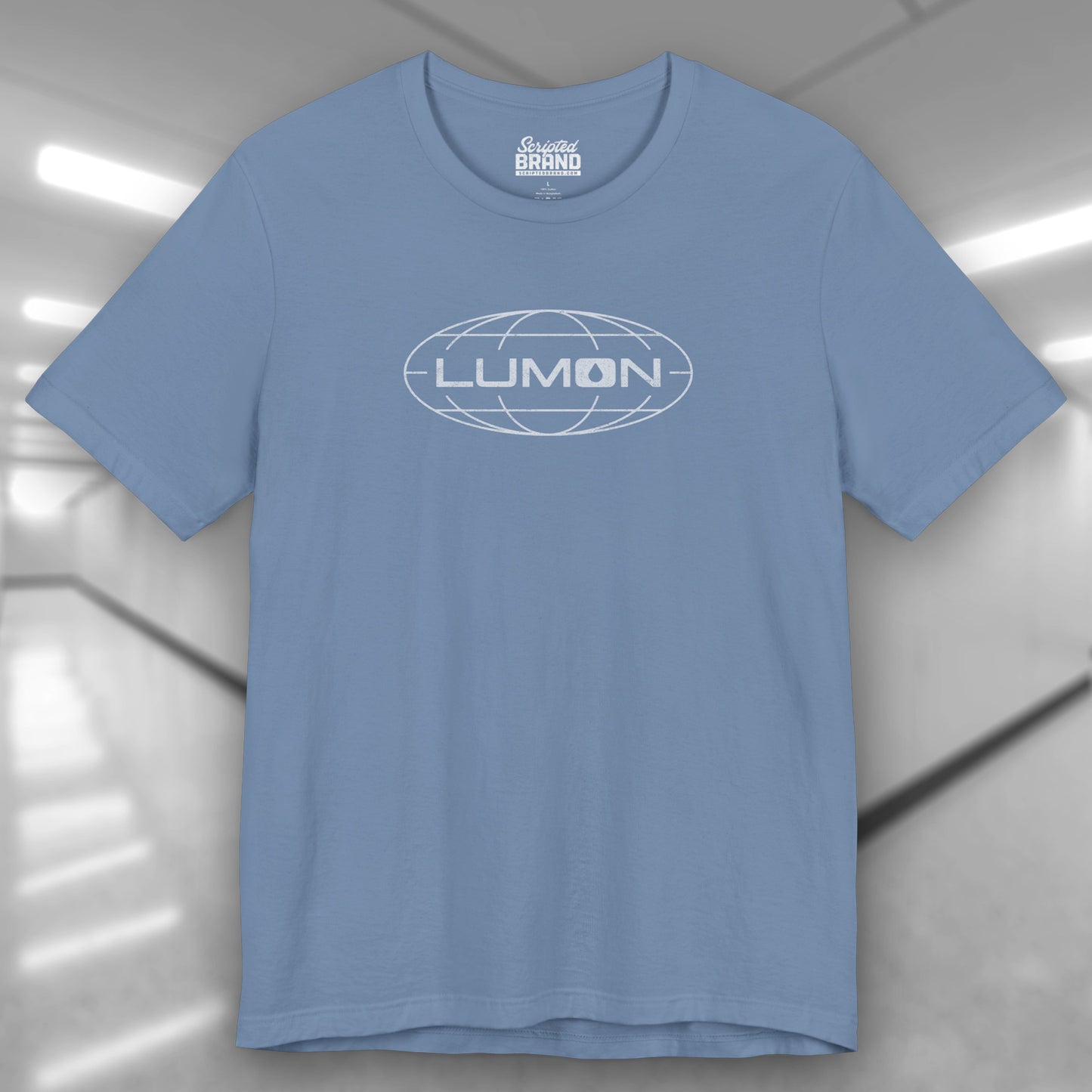 Steel blue colored soft Bella+Canvas shirtsleeve t-shirt with the Lumon Industries logo from the TV show Severance in a vintage distressed ink-stamped style.