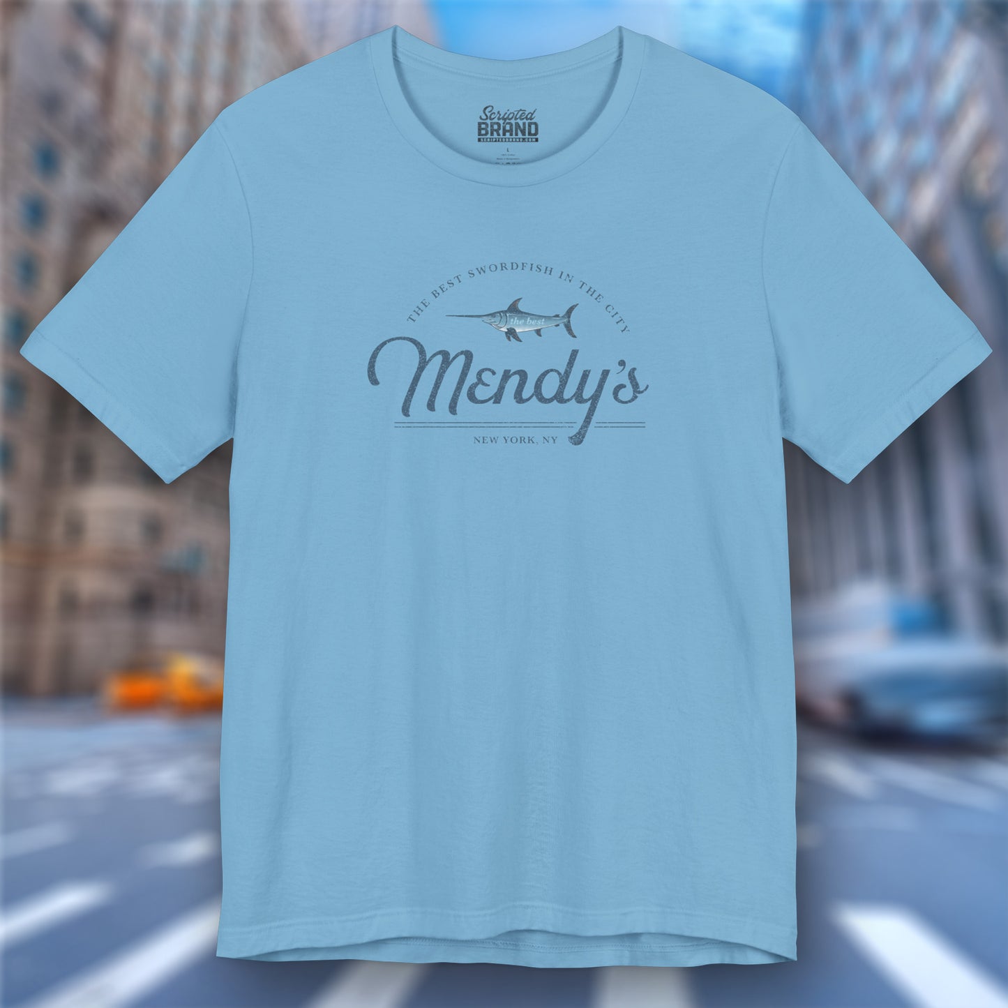 Front view of an ocean blue colored soft unisex Bella+Canvas 3001 short-sleeve t-shirt featuring a unique Mendy's Restaurant logo graphic, designed by ScriptedBrand in a vintage distressed style, and inspired by the TV show Seinfeld.