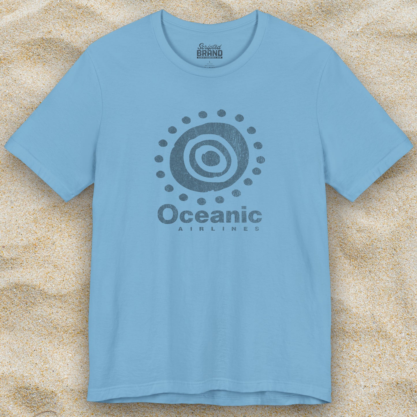 Ocean blue t-shirt featuring the Oceanic Airlines logo graphic from the TV show LOST in a vintage distressed style.