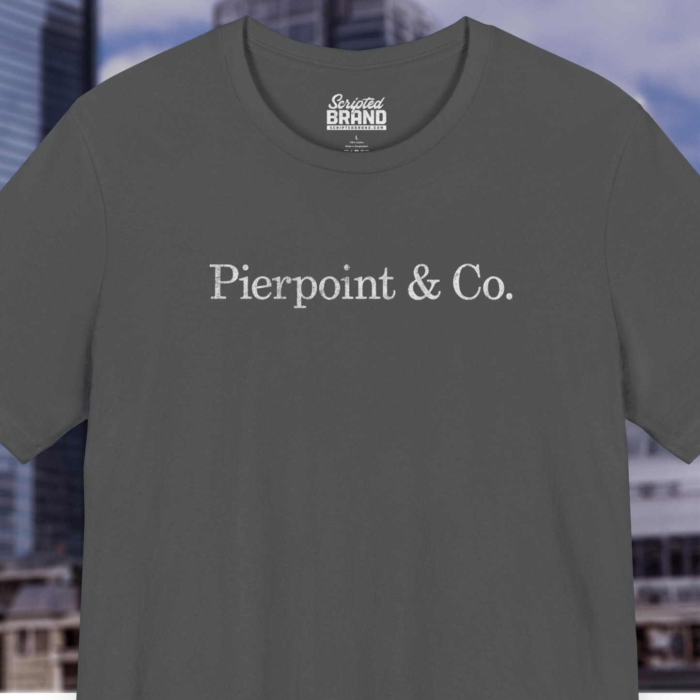 Front view of an asphalt grey soft short-sleeve Bella+Canvas 3001 t-shirt featuring the fictional logo Pierpoint & Co from the HBO TV show Industry in a vintage distressed style, sold by ScriptedBrand.