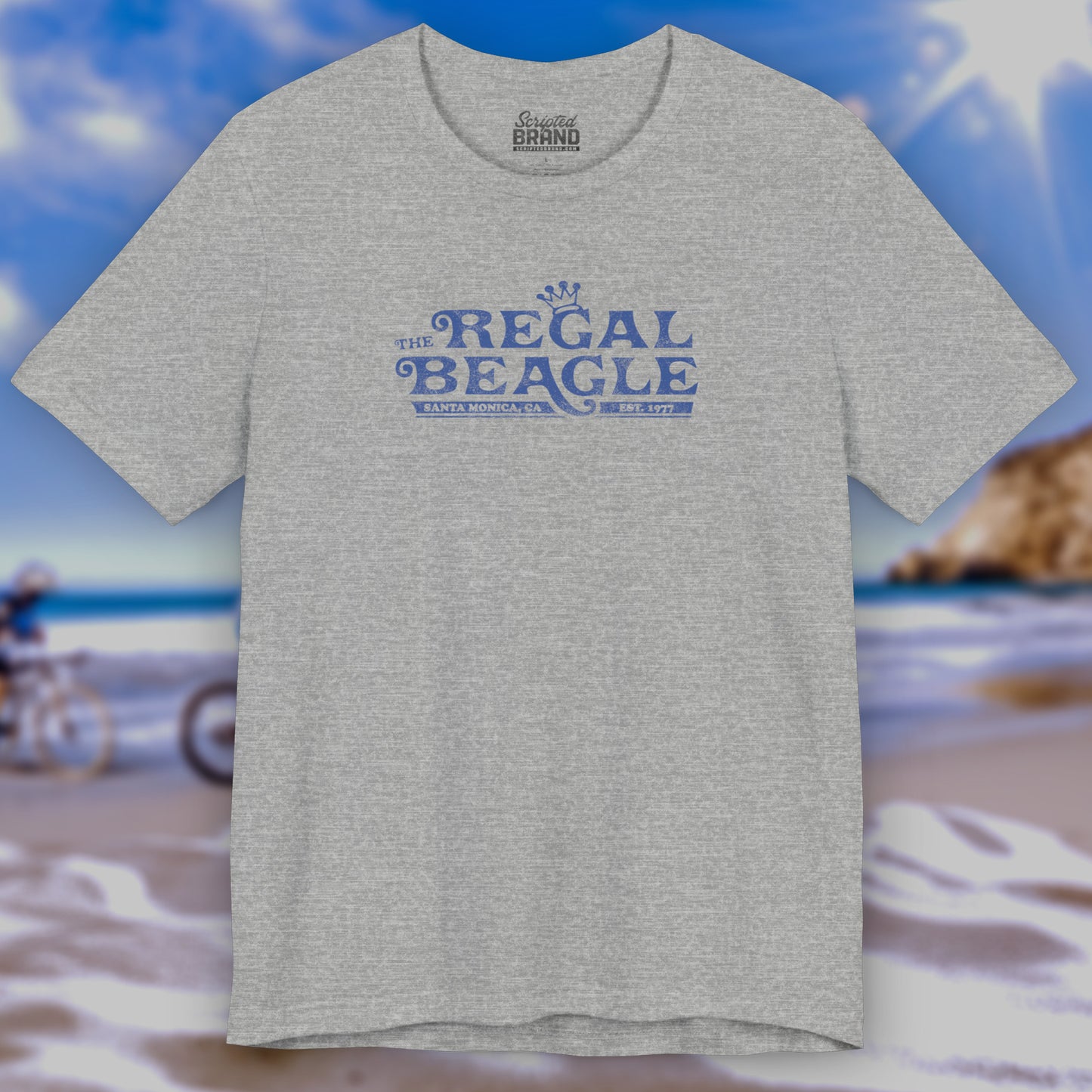 Front view of a heather gray colored soft Bella+Canvas 3001 short-sleeve t-shirt featuring the Regal Beagle logo from the TV Show Threes Company in a vintage distressed style.