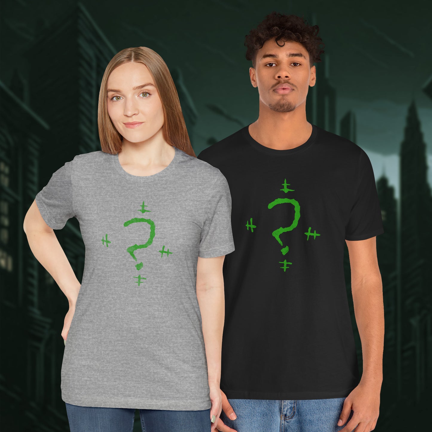Two people wearing t-shirts featuring the Riddler Question Mark logo from the movie The Batman in vintage distressed style.