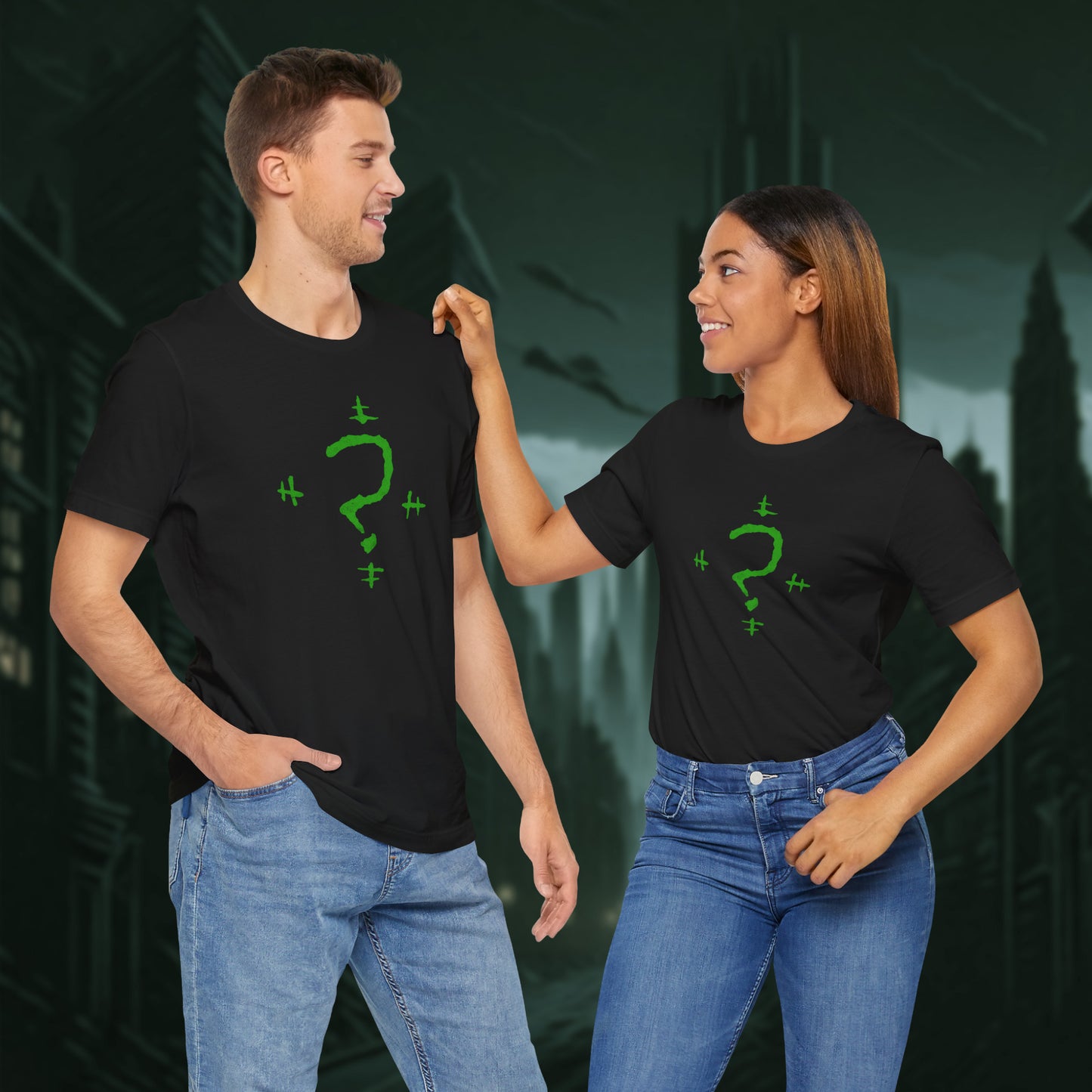 Two people wearing black t-shirts featuring the Riddler Question Mark logo from the movie The Batman in vintage distressed style.