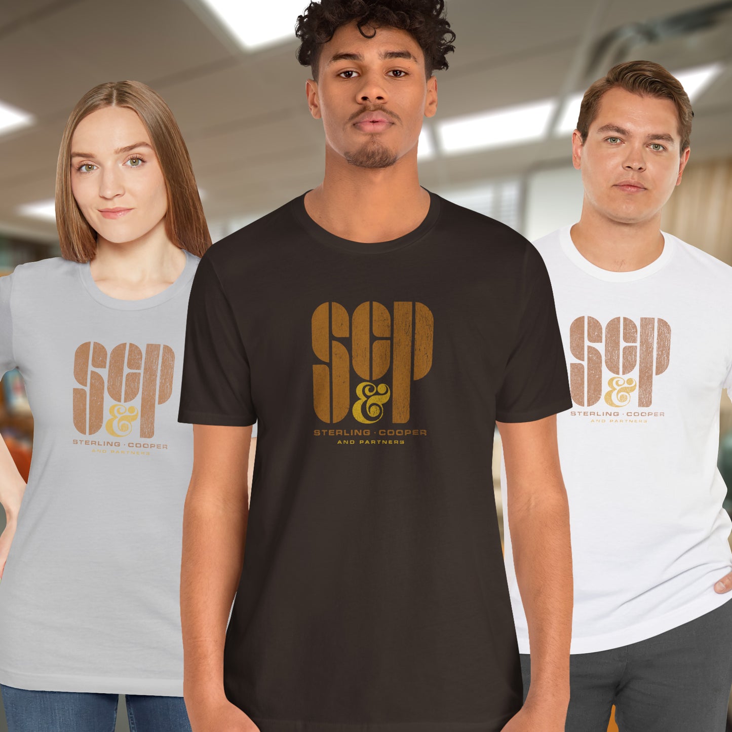 3 models wearing soft unisex Bella+Canvas 3001 short-sleeve t-shirts featuring the Sterling Cooper & Partners logo graphic from the TV Show Mad Men in a vintage distressed style, sold by ScriptedBrand.