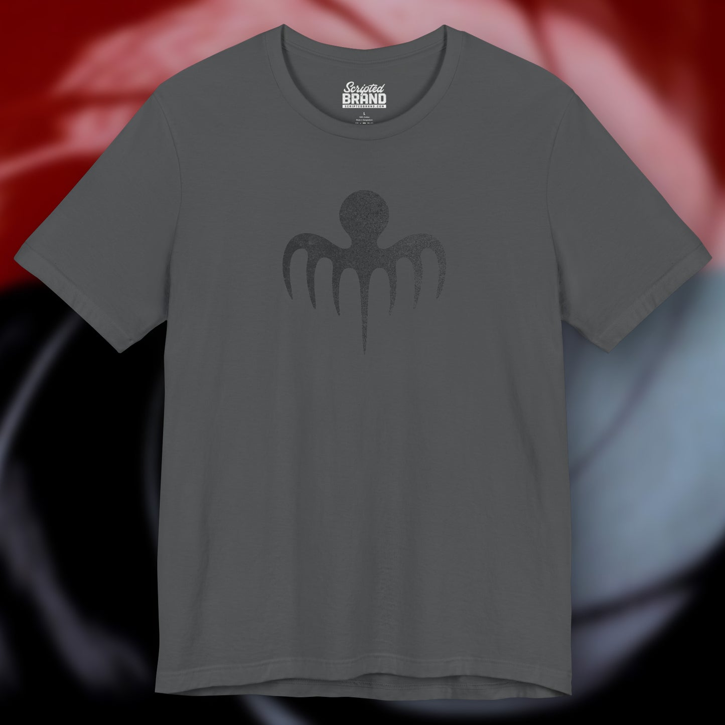 Front view of an asphalt grey colored soft Bella+Canvas 3001 short-sleeve t-shirt featuring a logo graphic of the fictional criminal organization Spectre, inspired by the James Bond movie franchise, in a vintage distressed style.