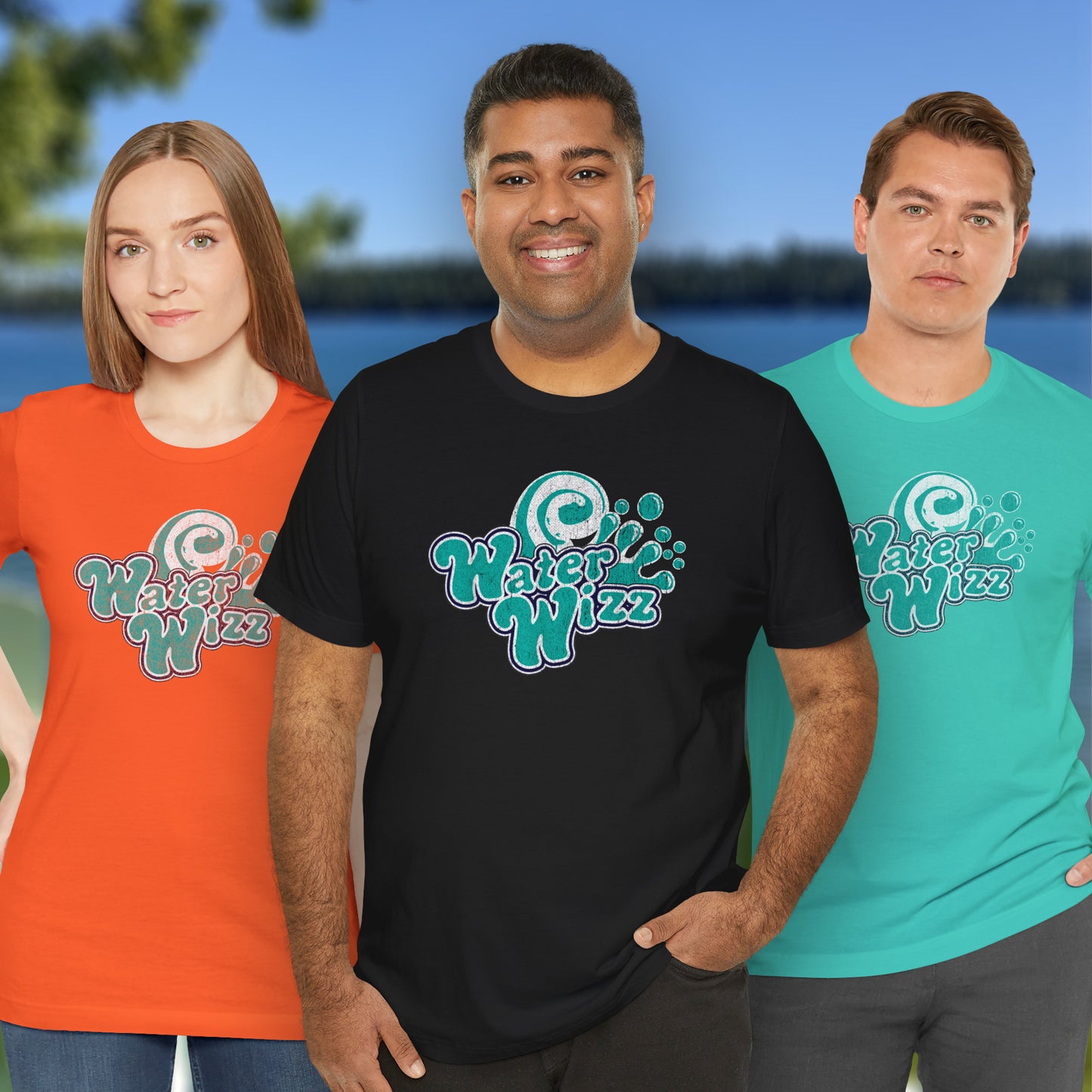 3 models wearing Soft short-sleeve t-shirts featuring the Water Wizz logo graphic from the movie Grown Ups in a vintage distressed style.