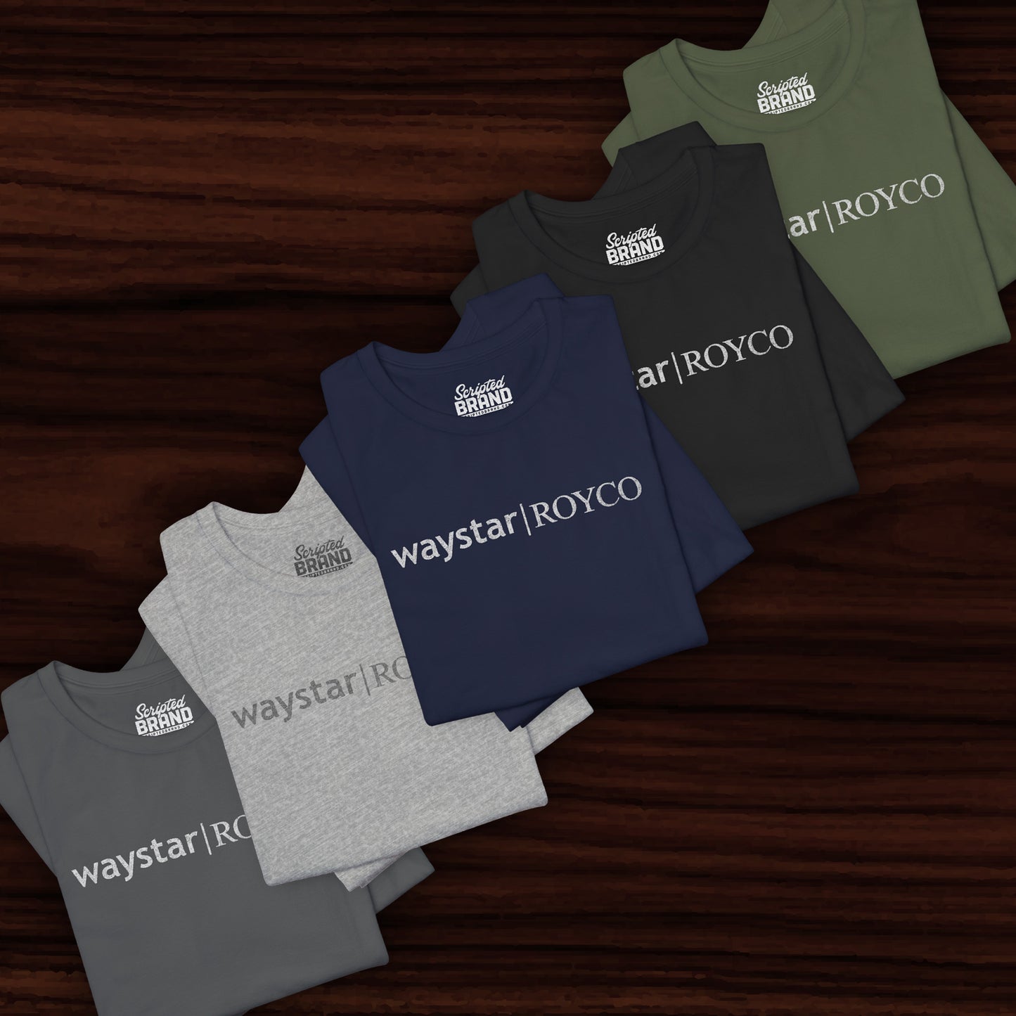 Group of 5 folded soft Bella+Canvas 3001 short-sleeve t-shirts featuring the Waystar Royco logo from the TV show Succession in a vintage distressed style, sold by ScriptedBrand.