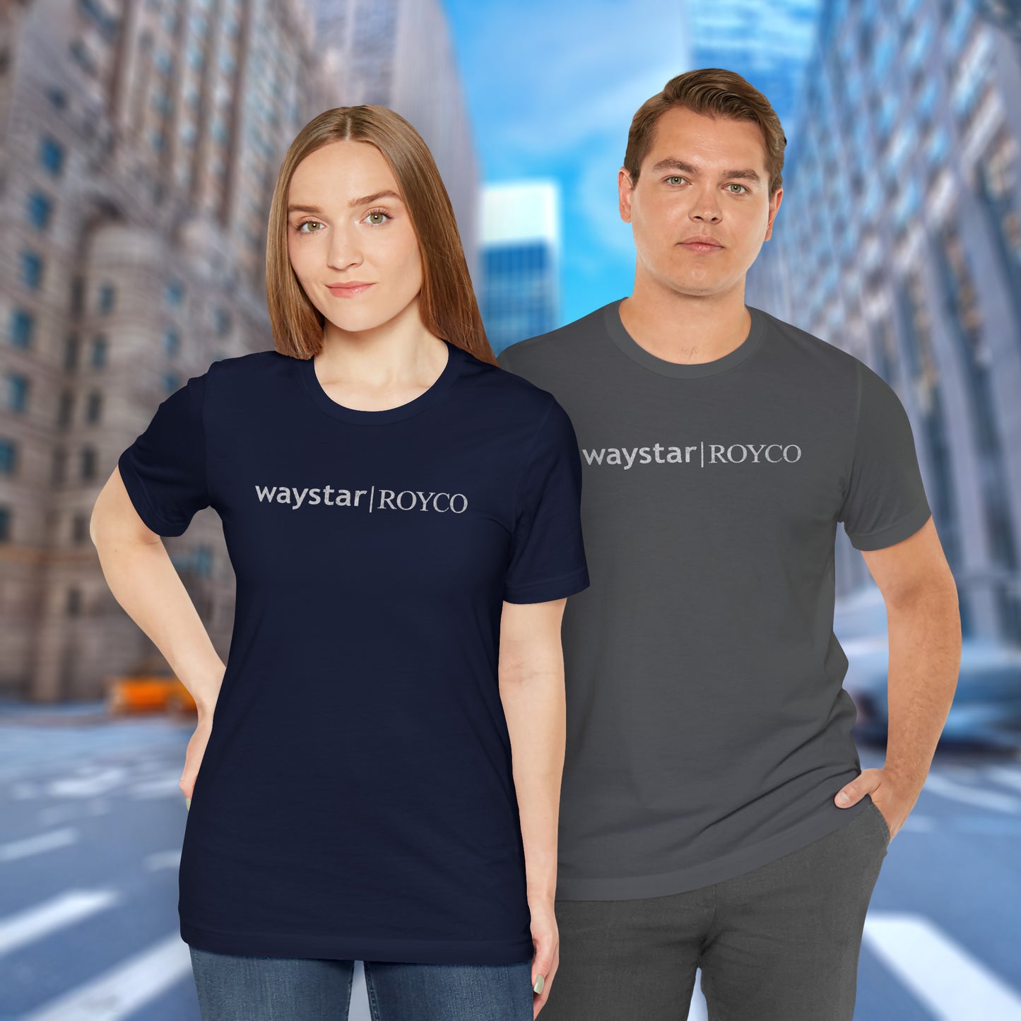 2 models wearing soft Bella+Canvas 3001 short-sleeve t-shirts featuring the Waystar Royco logo from the TV show Succession in a vintage distressed style, sold by ScriptedBrand.