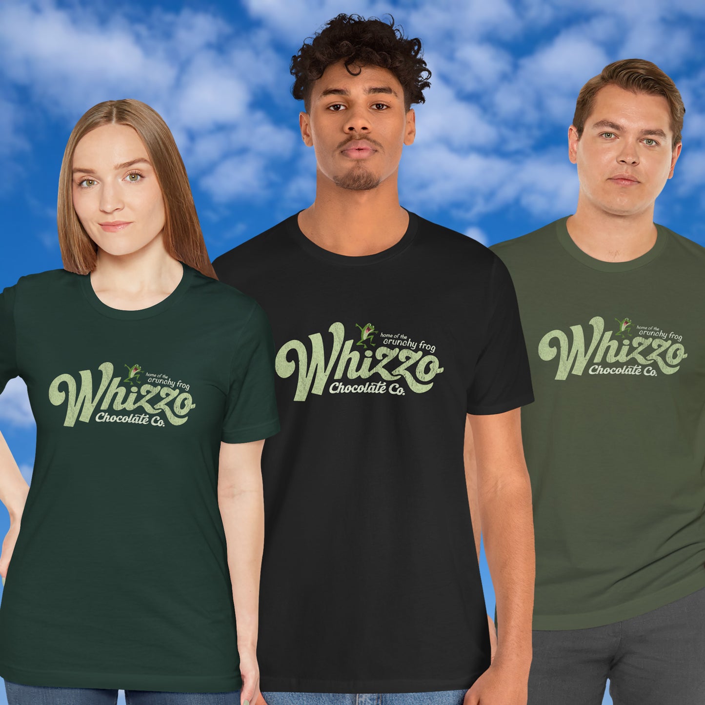 3 models wearing t-shirts with vintage Whizzo Chocolate Co. logo, inspired by Monty Python, featuring “home of the crunchy frog” graphic.