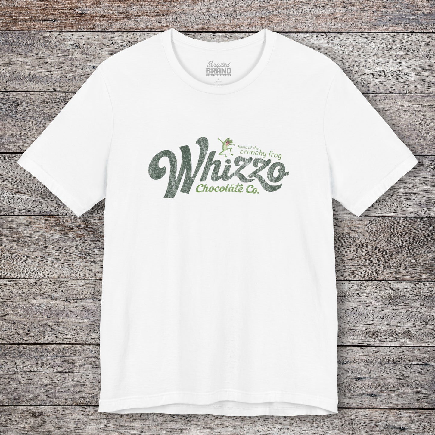 White t-shirt with vintage Whizzo Chocolate Co. logo, inspired by Monty Python, featuring “home of the crunchy frog” graphic.