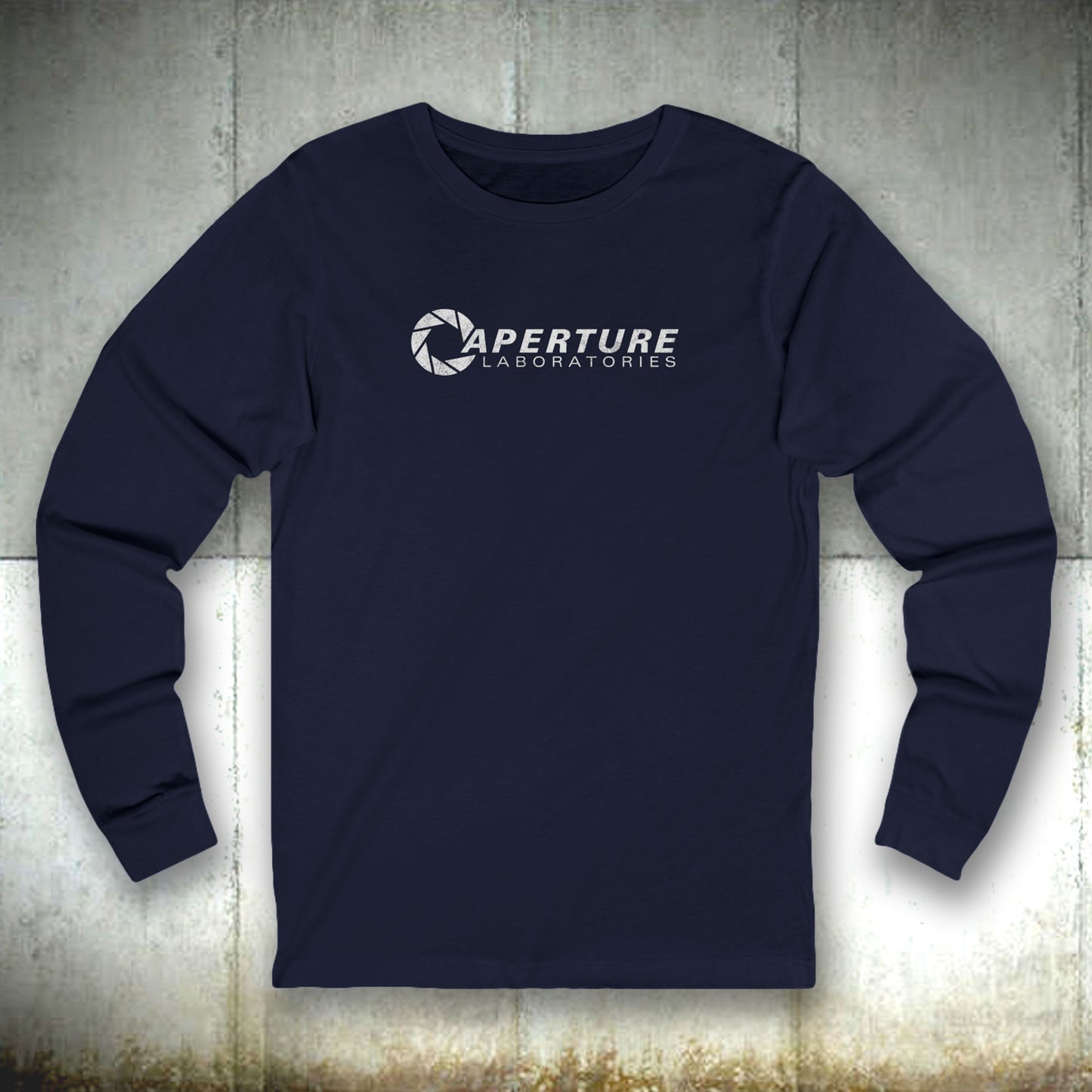 Front view of a navy blue colored soft long-sleeve t-shirt featuring the Aperture Laboratories logo from the video game Portal and Portal 2 in a vintage distressed style, sold by ScriptedBrand.