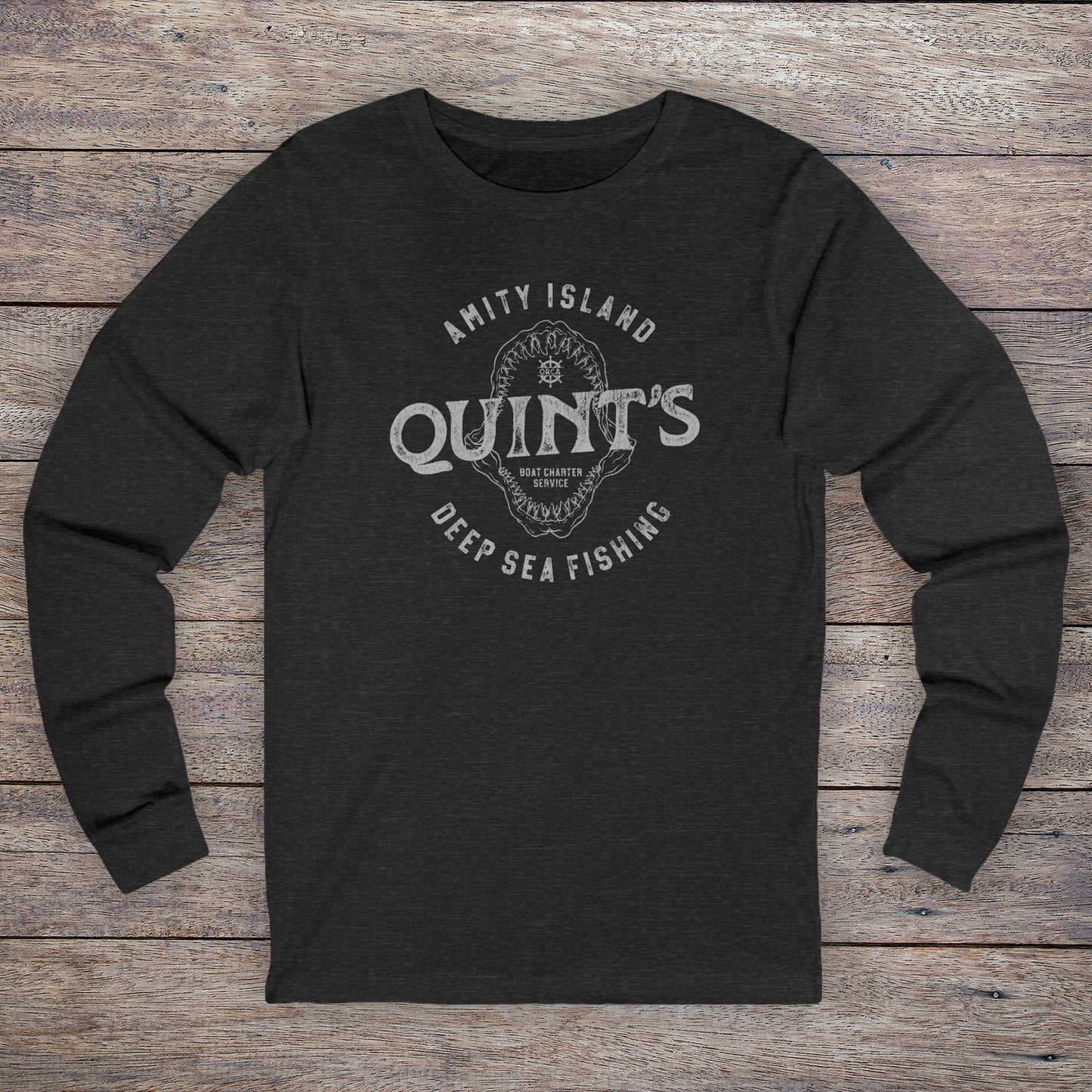 Long-sleeve t-shirt with vintage Quint’s Deep Sea Fishing logo from Jaws, printed on dark heather fabric.