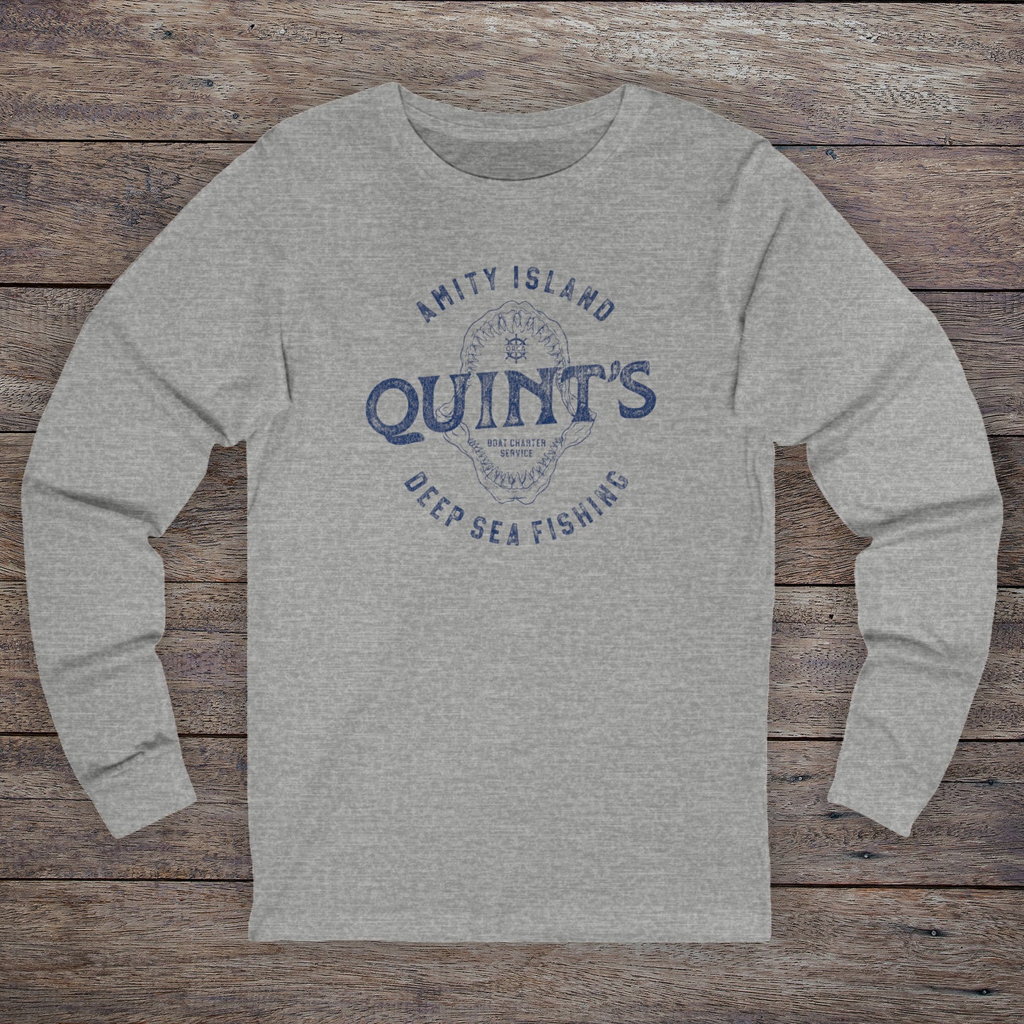 Long-sleeve t-shirt with vintage Quint’s Deep Sea Fishing logo from Jaws, printed on athletic heather grey fabric.