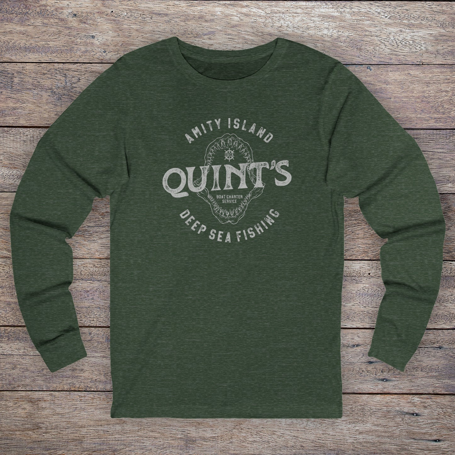 Long-sleeve t-shirt with vintage Quint’s Deep Sea Fishing logo from Jaws, printed on heather forest green fabric.