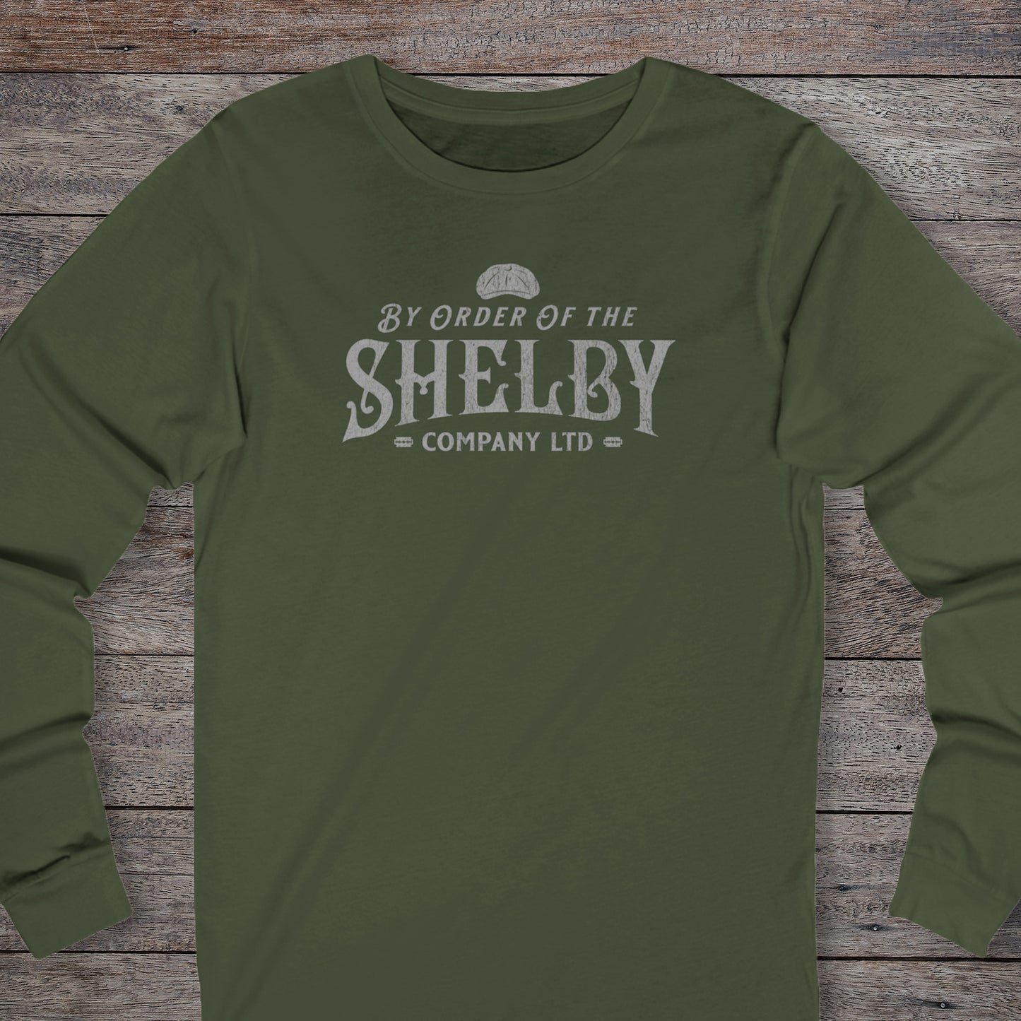 Front view of a military green Shelby Company Ltd long-sleeve tee with vintage logo from Peaky Blinders