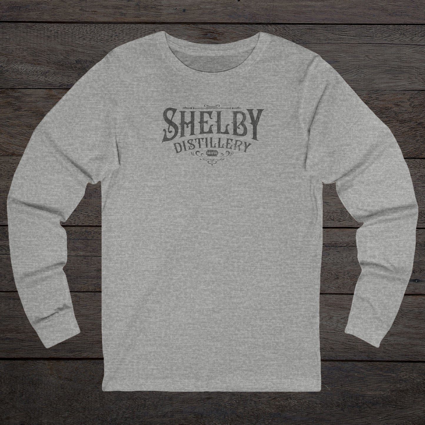Athletic Heather Gray Soft Unisex Bella+Canvas 3501 long-sleeve t-shirt featuring a Shelby Company Limited Distillery Logo Graphic inspired by the TV show Peaky Blinders in a vintage distressed style, sold by ScriptedBrand.