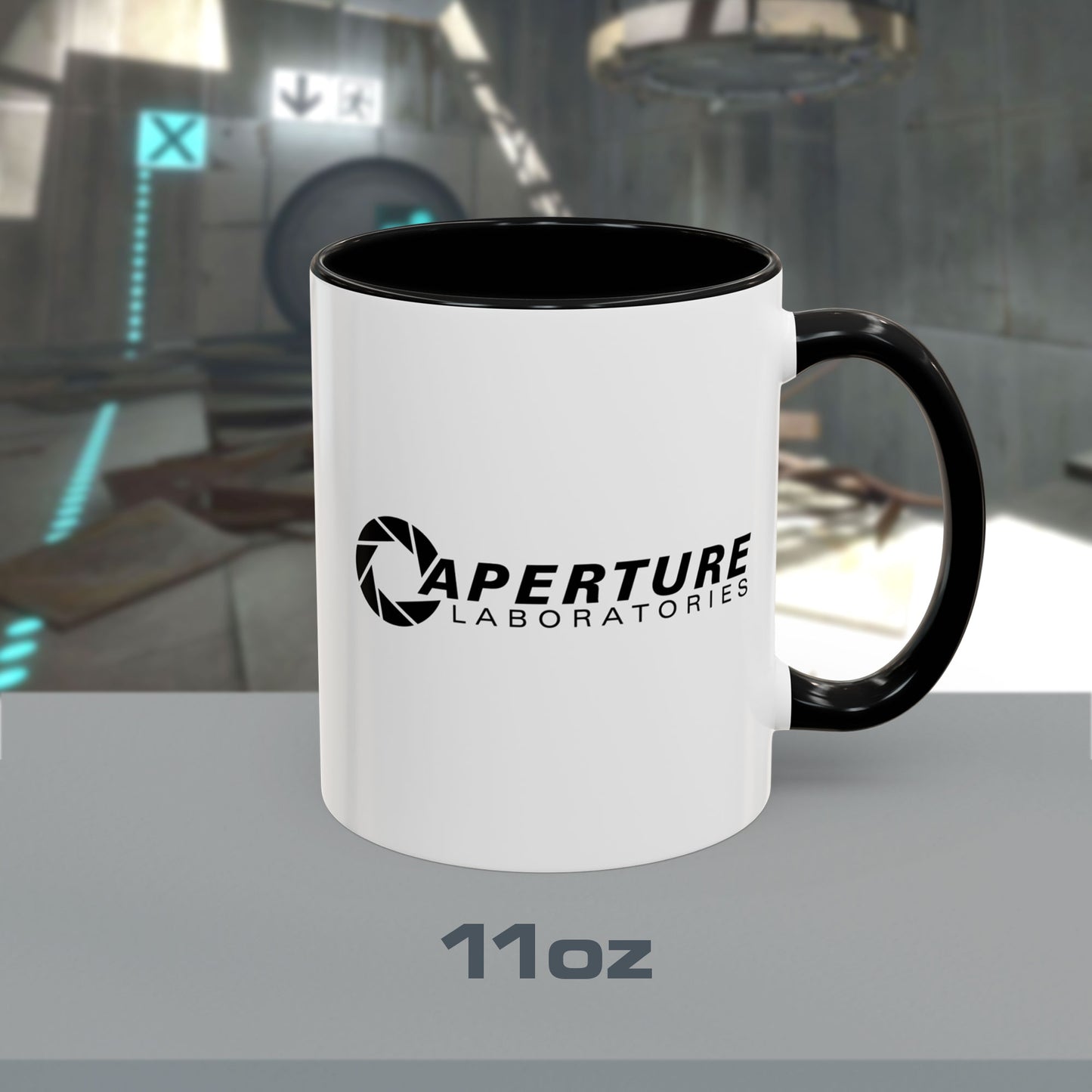 11 oz white Ceramic Accent Mug with the black Aperture Laboratories logo from the video game Portal on both sides. Handle and interior are colored black.
