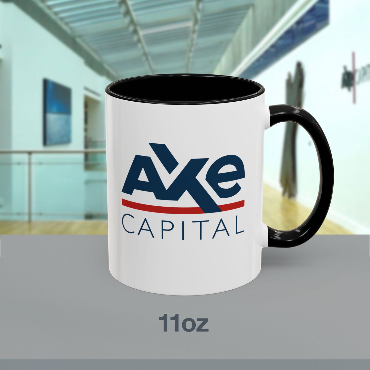 Front view of an 11 oz White Ceramic Mug with black handle/interior featuring the fictional Axe Capital logo from the TV show Billions printed on both sides, sold by ScriptedBrand.