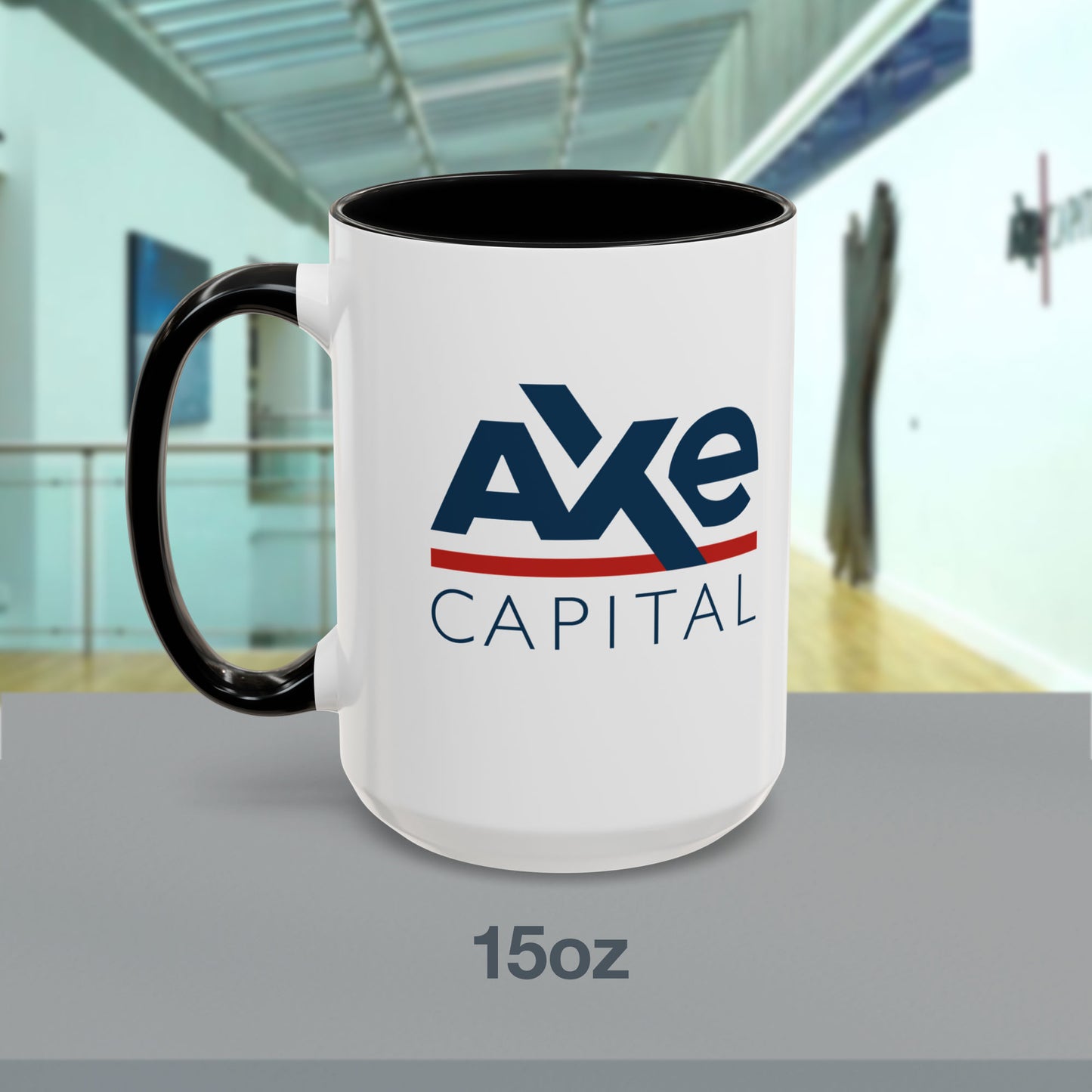Front view of a 15 oz White Ceramic Mug with black handle/interior featuring the fictional Axe Capital logo from the TV show Billions printed on both sides, sold by ScriptedBrand.