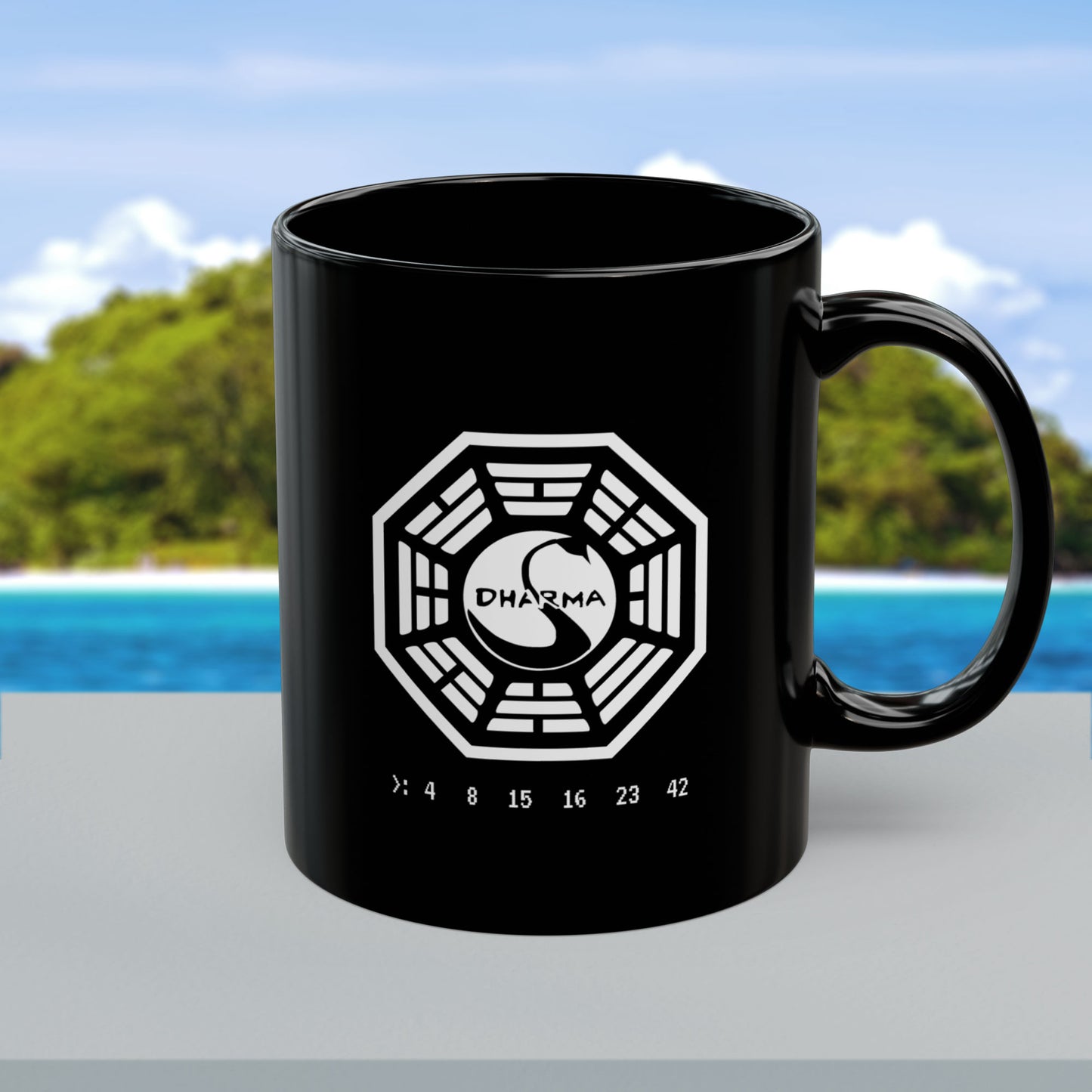 Front view of an 11 oz Black Ceramic Mug featuring the Dharma Initiative swan station logo from the TV show LOST, including the Hatch numbers 4 8 15 16 23 42. Graphic is printed white on both sides.