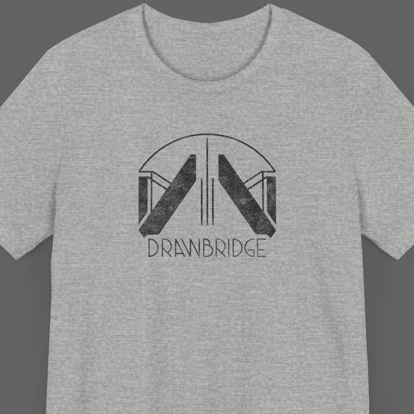 Front view of an athletic heather grey colored soft Bella+Canvas 3001 short-sleeve t-shirt featuring the Drawbridge logo from the video game Death Stranding 2, in a vintage distressed style, sold by ScriptedBrand.
