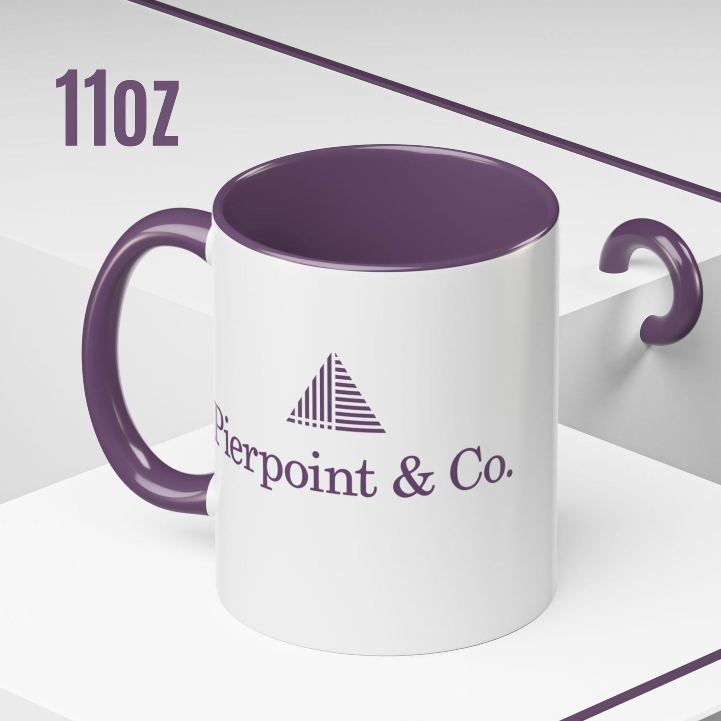 Angled view of 11 oz white ceramic mug with purple Pierpoint & Co. logo, handle, and interior inspired by the HBO series Industry.