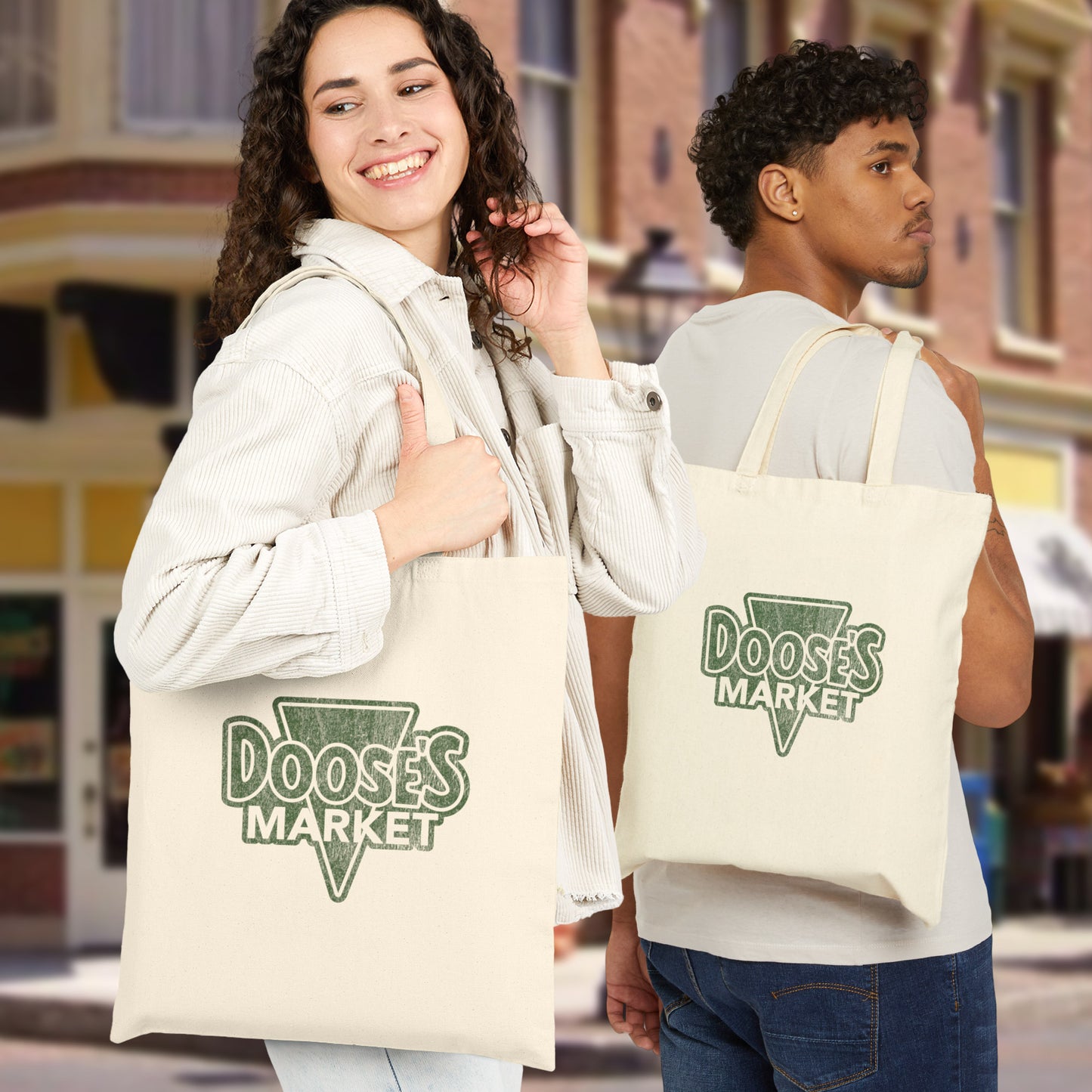 Two people carrying cotton canvas tote bags with vintage green Doose’s Market logo on both sides, inspired by Gilmore Girls.