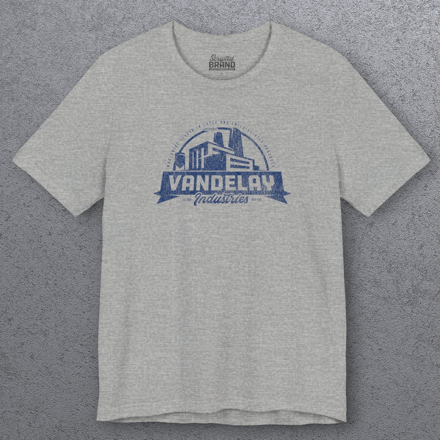 Front view of an Athletic Heather Grey Soft Bella+Canvas 3001 short-sleeve t-shirt tee featuring a Vandelay Industries logo graphic, uniquely designed by ScriptedBrand in a vintage distressed style. The fictional company is part of the George Costanza storyline in the TV show Seinfeld.