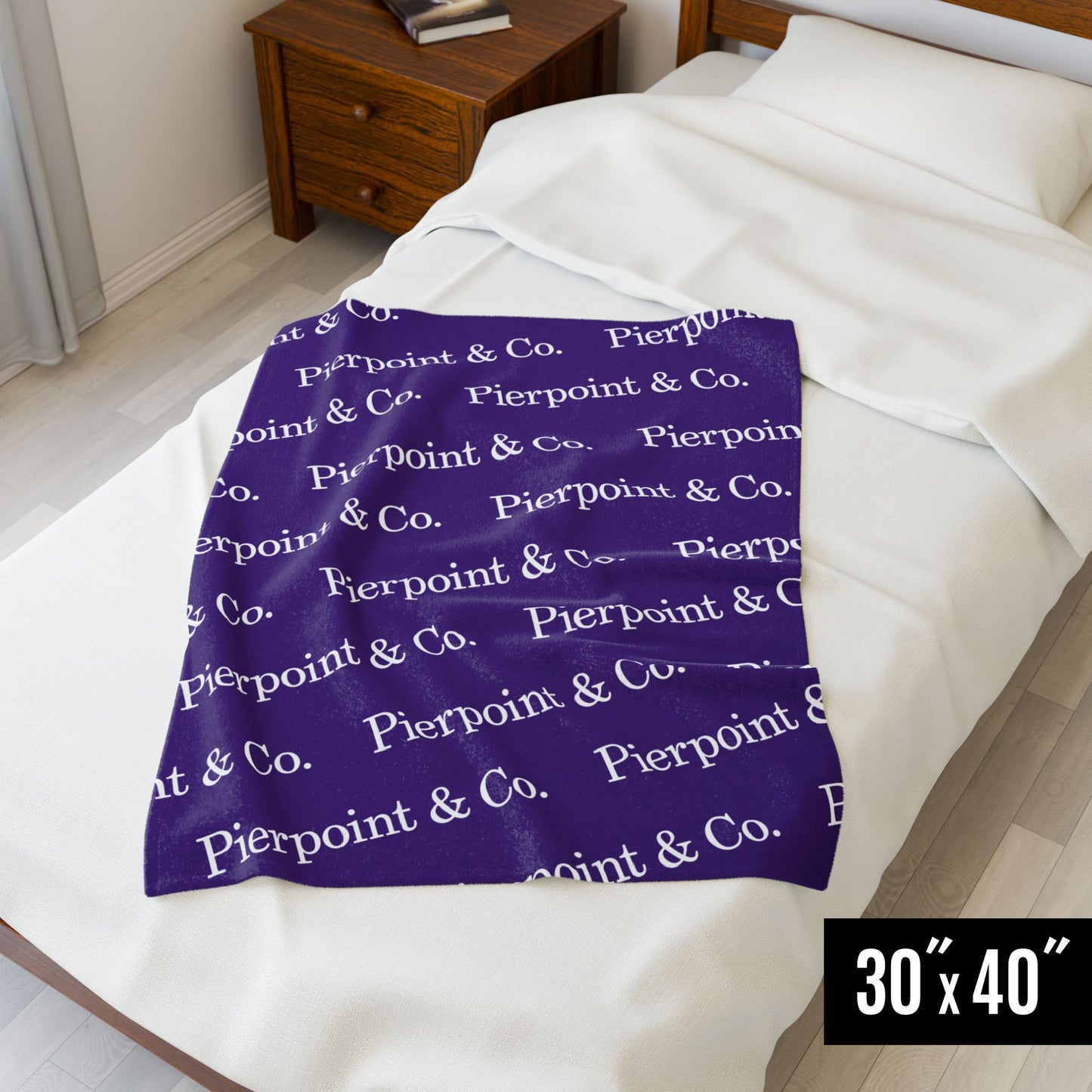 30" x 40" Velveteen Plush Purple Blanket featuring a step and repeat pattern of Pierpoint & Co. logo from the HBO TV show Industry, placed on a small bed.