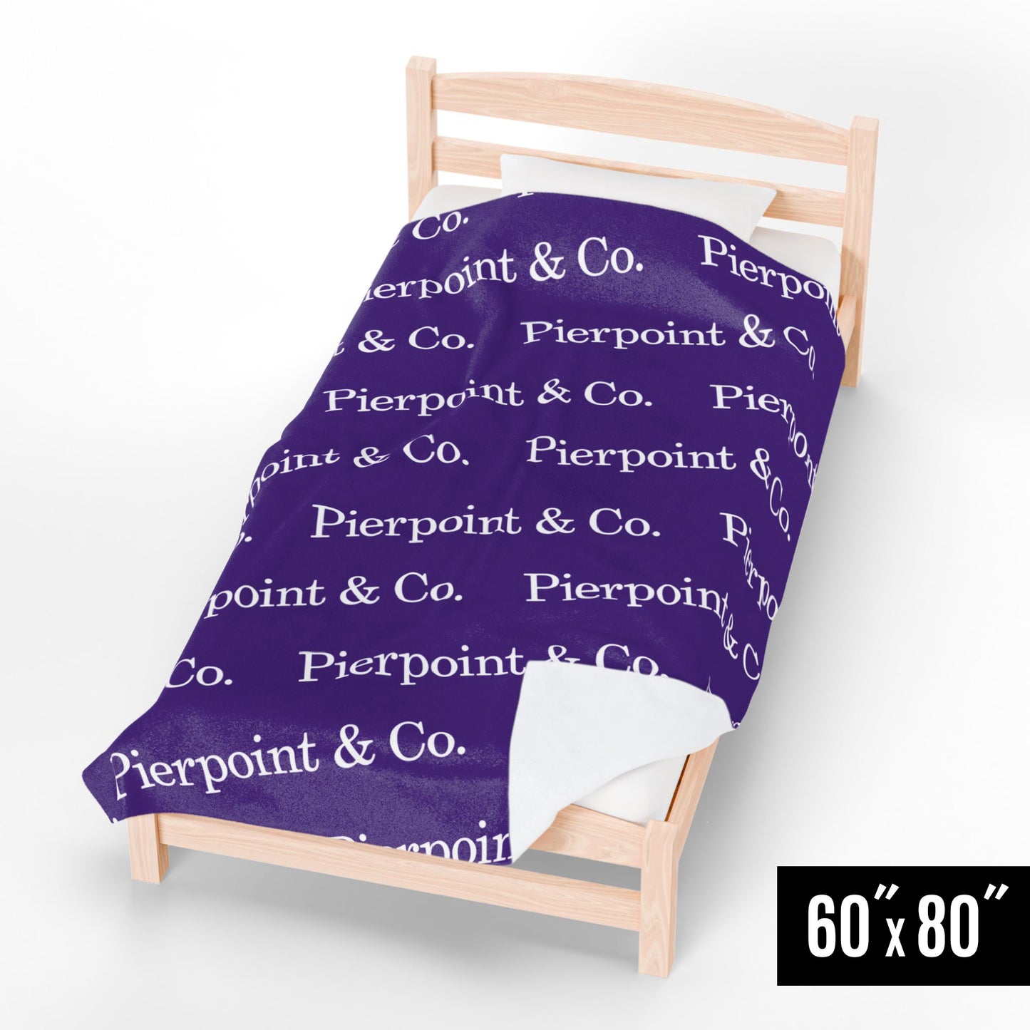 60" x 80" Velveteen Plush Blanket with a step and repeat pattern of Pierpoint & Co. logo from the HBO TV show Industry, placed on a wooden bed.