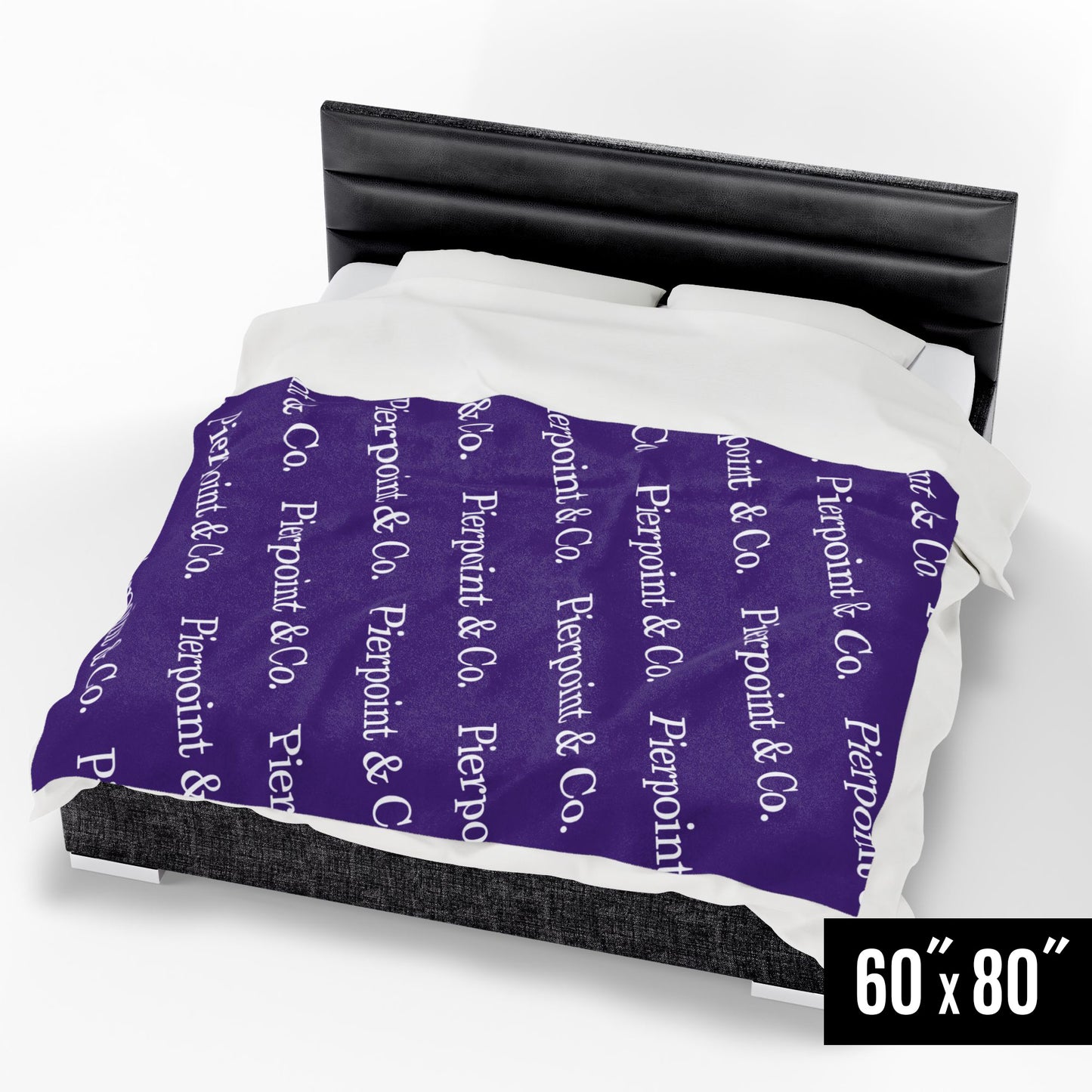 Angled view of 60" x 80" Velveteen Plush Blanket featuring a step and repeat pattern of Pierpoint & Co. logo from the HBO TV show Industry, on a queen bed.