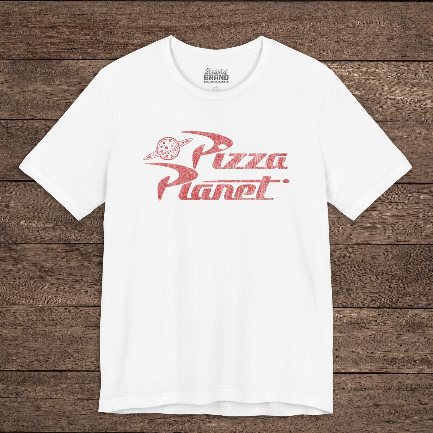 Front of white t-shirt with distressed red Pizza Planet logo inspired by the Toy Story movies.