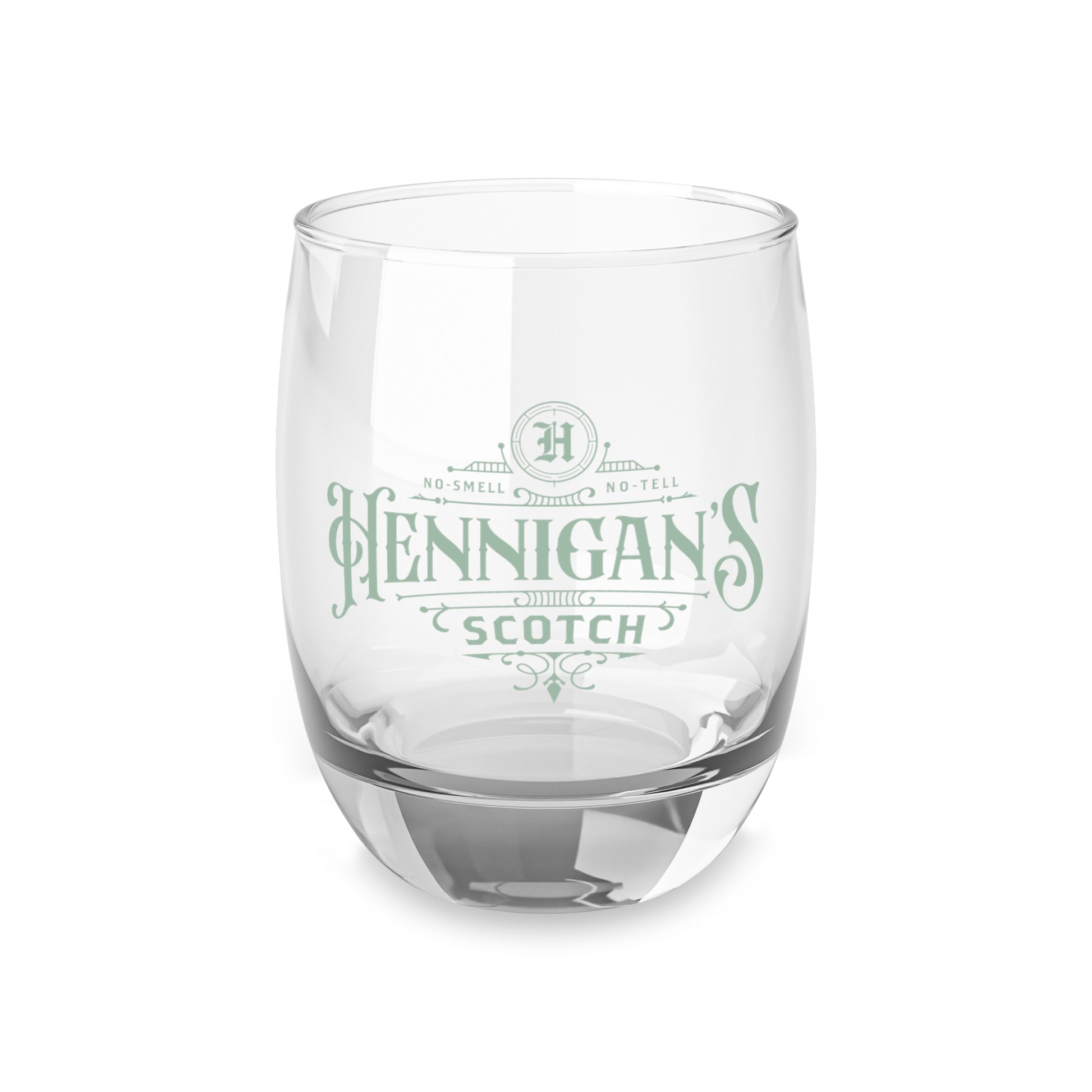 mockup of 6 ounce Whiskey Glass with Hennigan's Scotch logo designed by ScriptedBrand from the TV show Seinfeld.