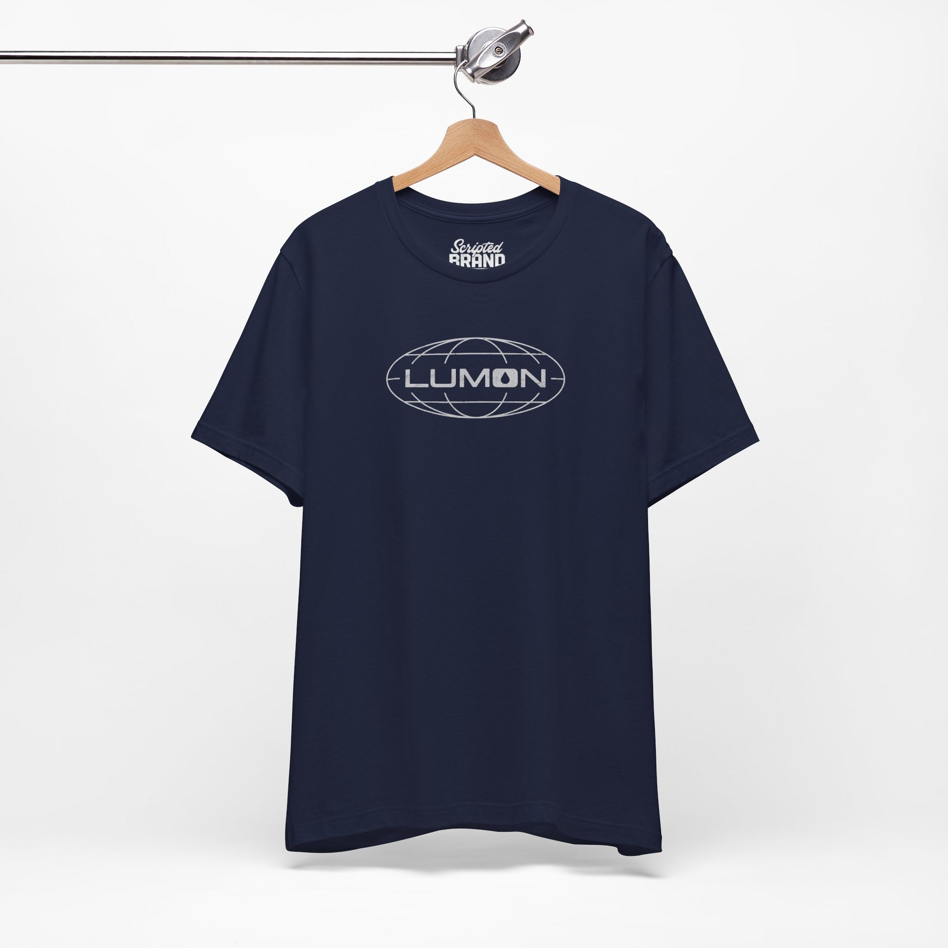 Navy blue colored soft Bella+Canvas shirtsleeve t-shirt with the Lumon Industries logo from the TV show Severance in a vintage distressed ink-stamped style, hanging on a hanger