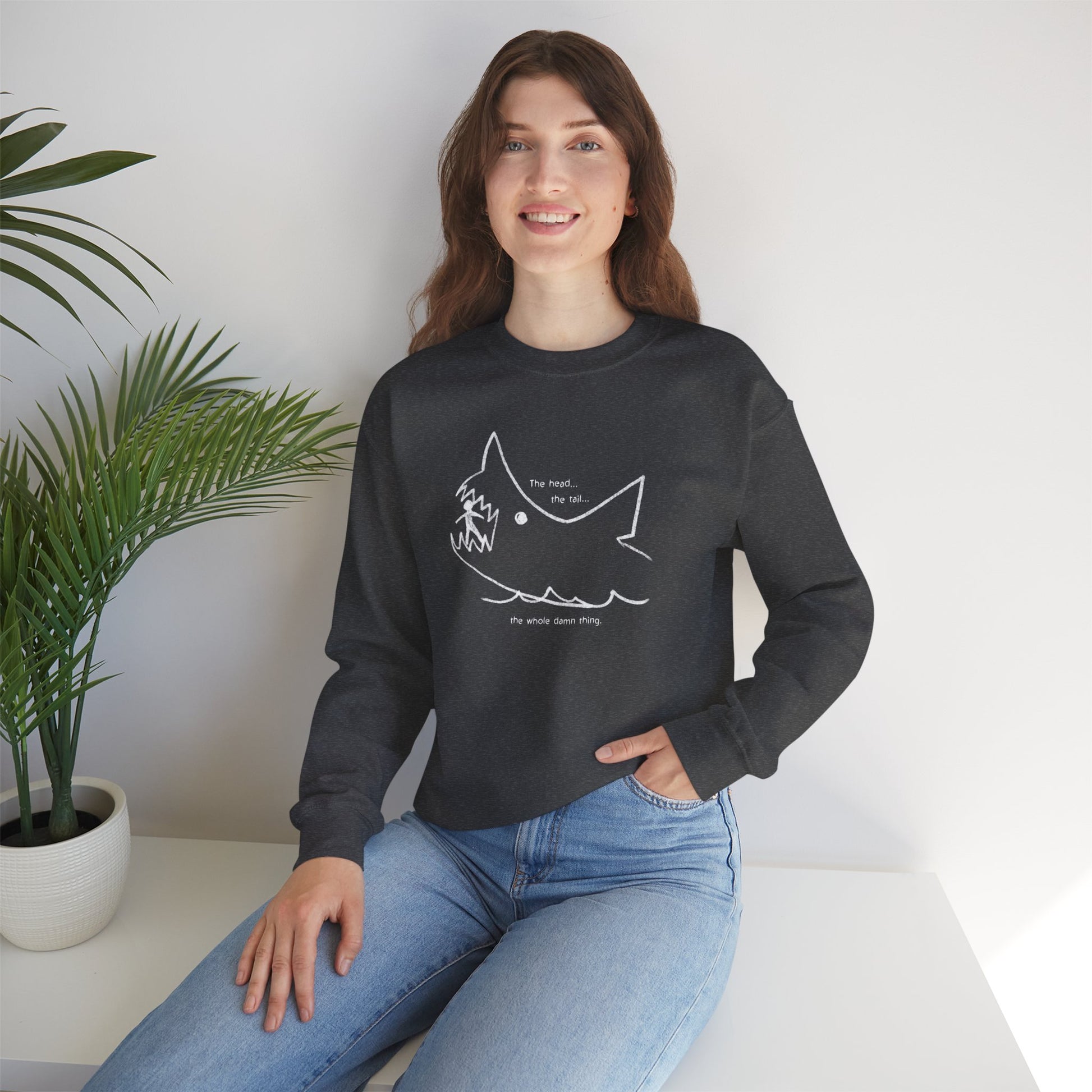 Female wearing dark heather grey Gildan 18000 sweatshirt with the chalkboard drawing by Quint in the movie Jaws.