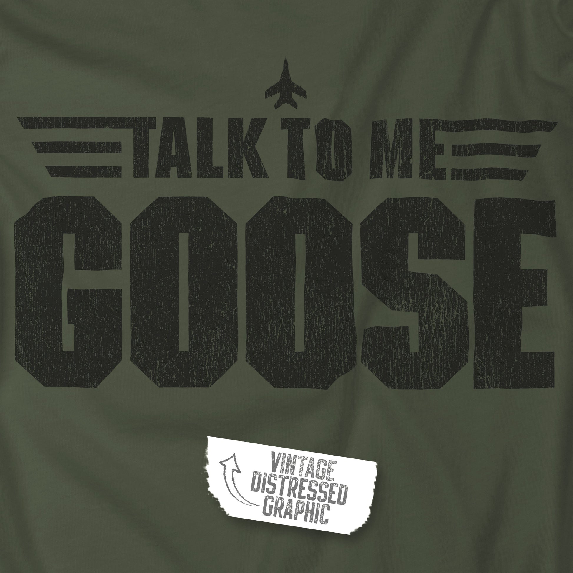Closeup of Military green crewneck sweatshirt with distressed “Talk to Me Goose” graphic, inspired by the movie Top Gun.