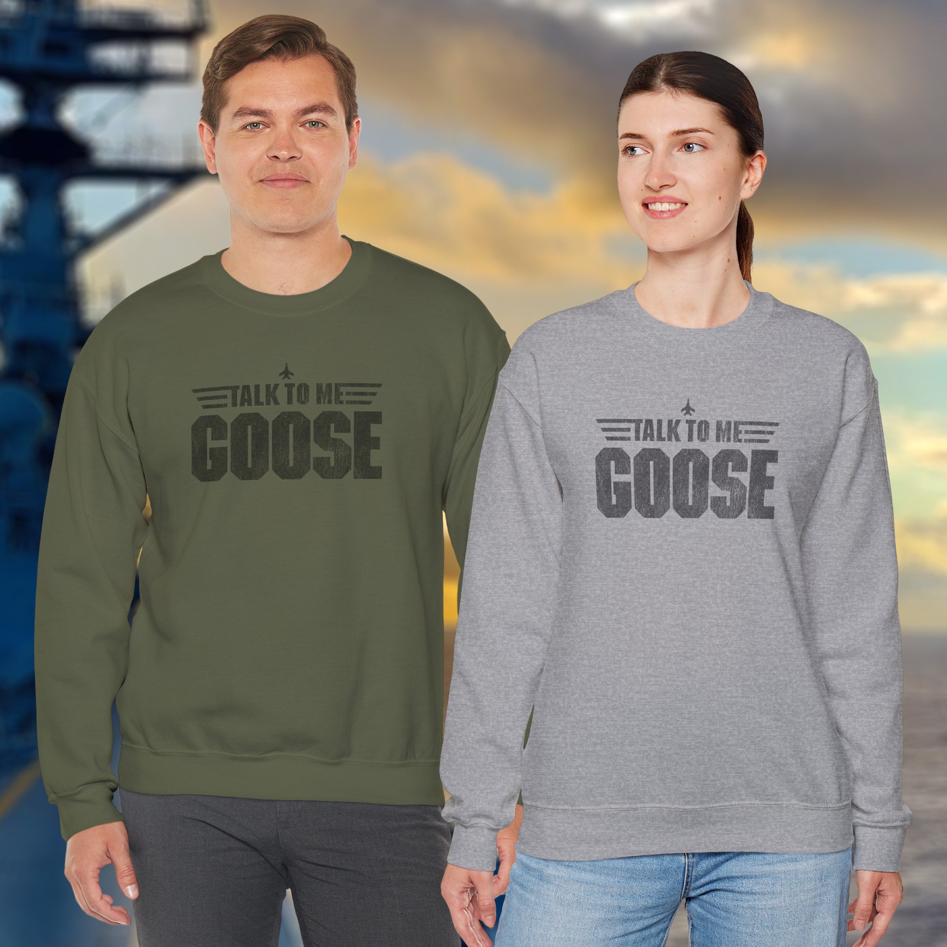 2 models wearing crewneck sweatshirts with distressed “Talk to Me Goose” graphic, inspired by the movie Top Gun.