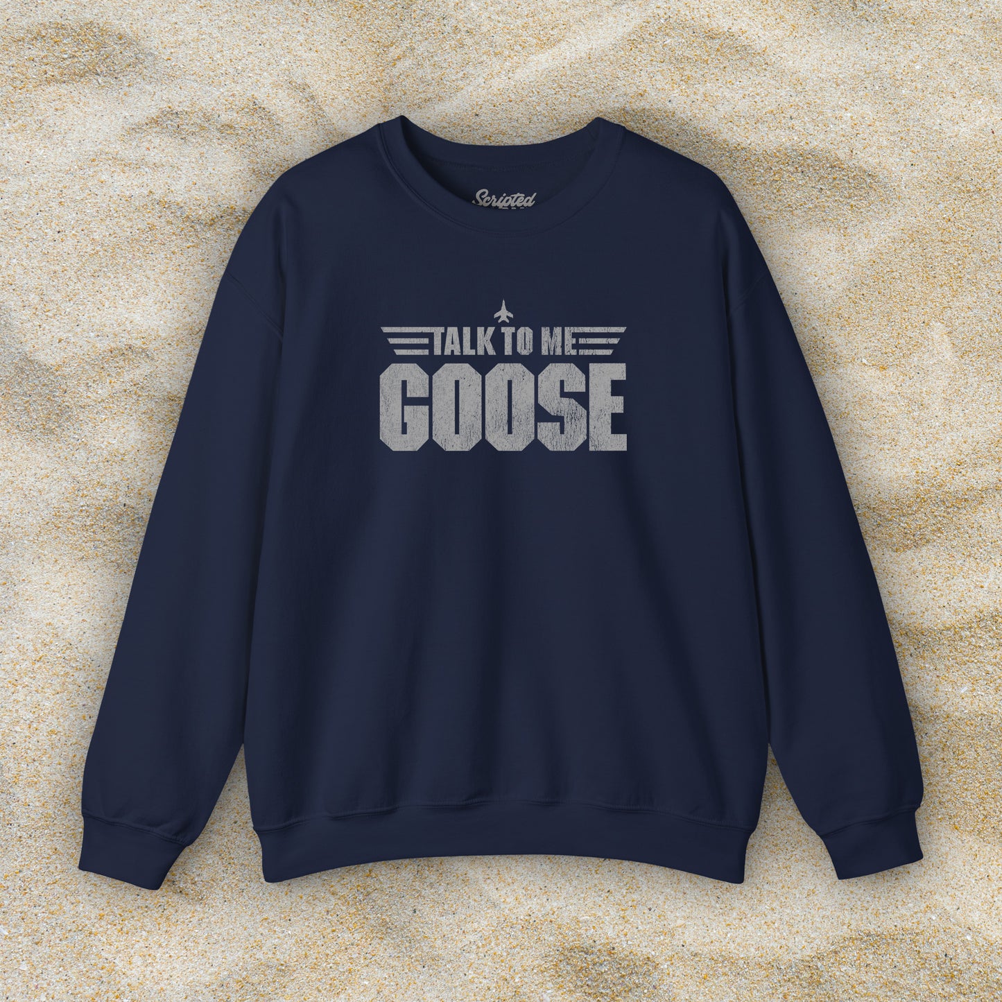 Front view of navy blue crewneck sweatshirt with distressed “Talk to Me Goose” graphic, inspired by the movie Top Gun.