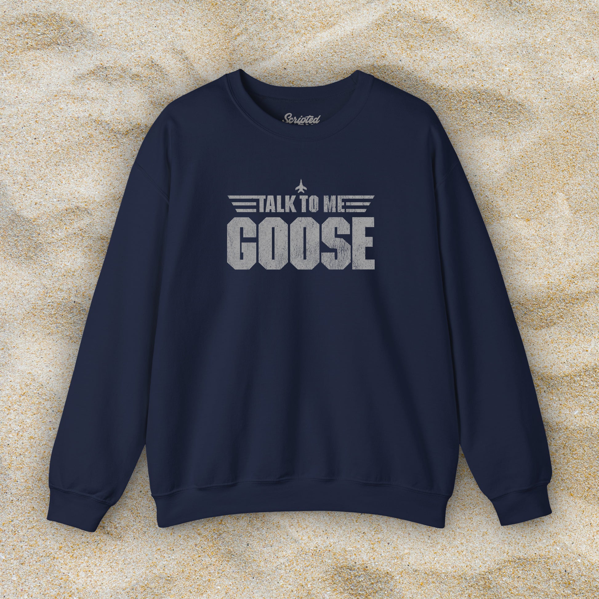 Front view of navy blue crewneck sweatshirt with distressed “Talk to Me Goose” graphic, inspired by the movie Top Gun.
