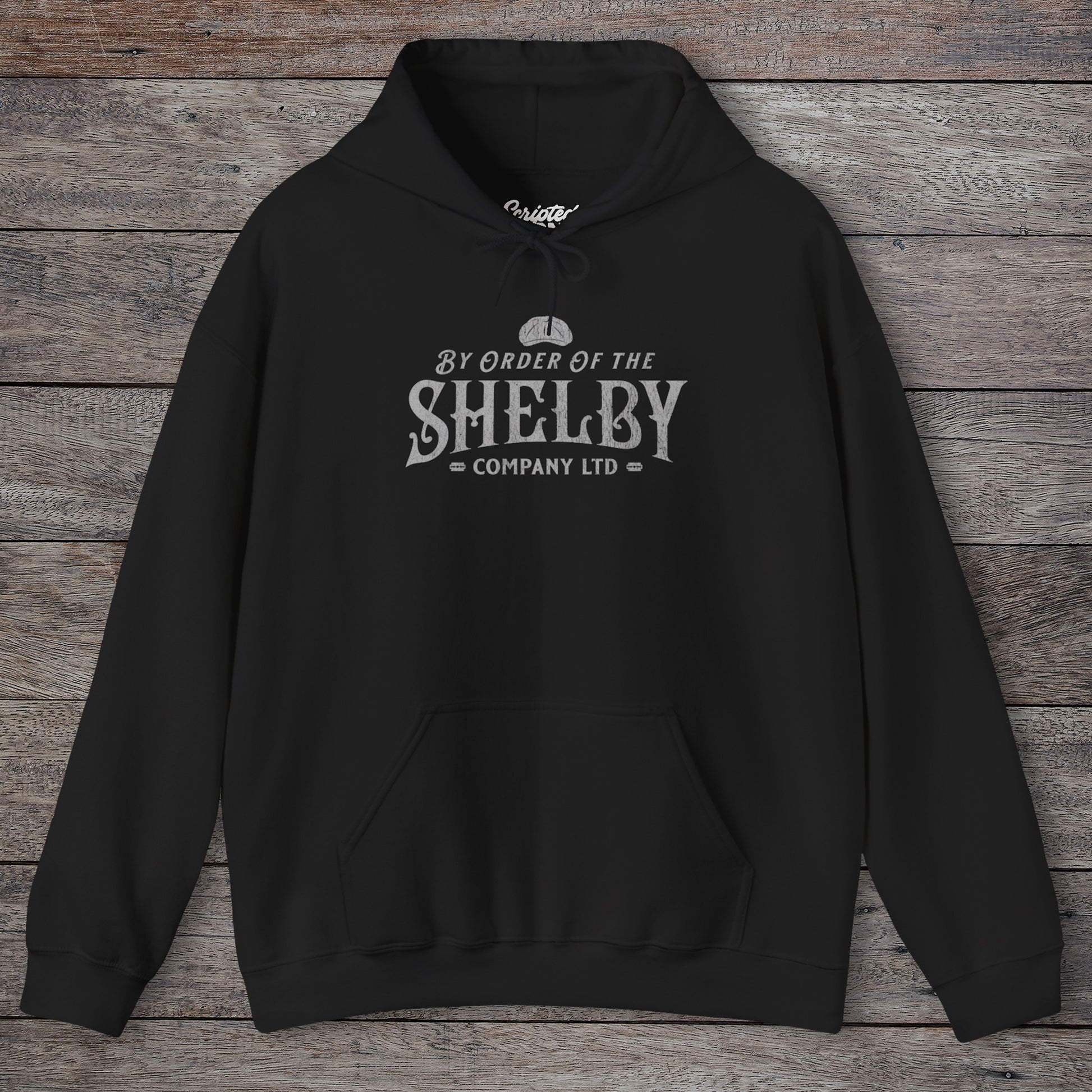 Front view of a black Shelby Company Ltd hoodie with vintage logo from Peaky Blinders, featuring flat cap and razor blades.